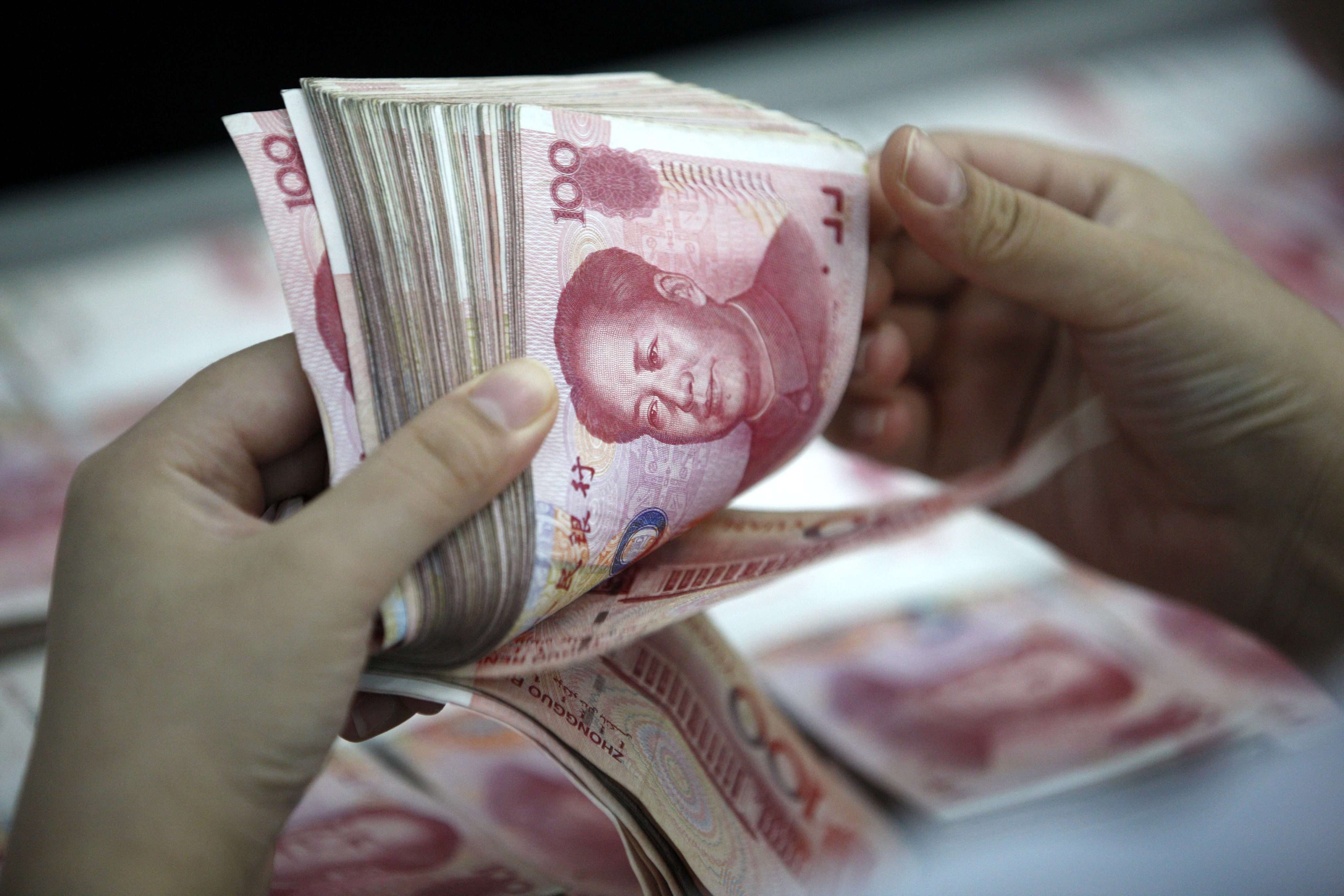 The yuan is the newest addition to the SDR basket. Photo: EPA