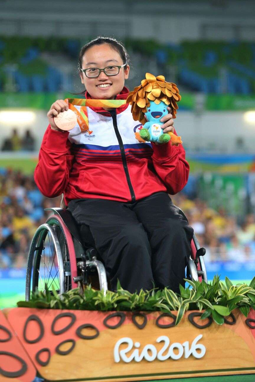 Chan Yui-chong shows off her bronze medal. Photos: HK Paralympic Committee