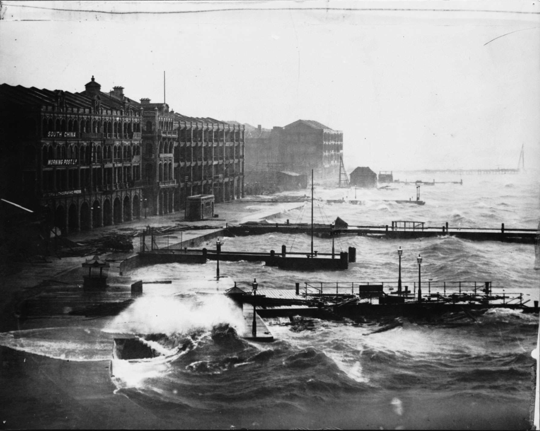 The South China Morning Post building on the Central waterfront during the 1906 typhoon.
