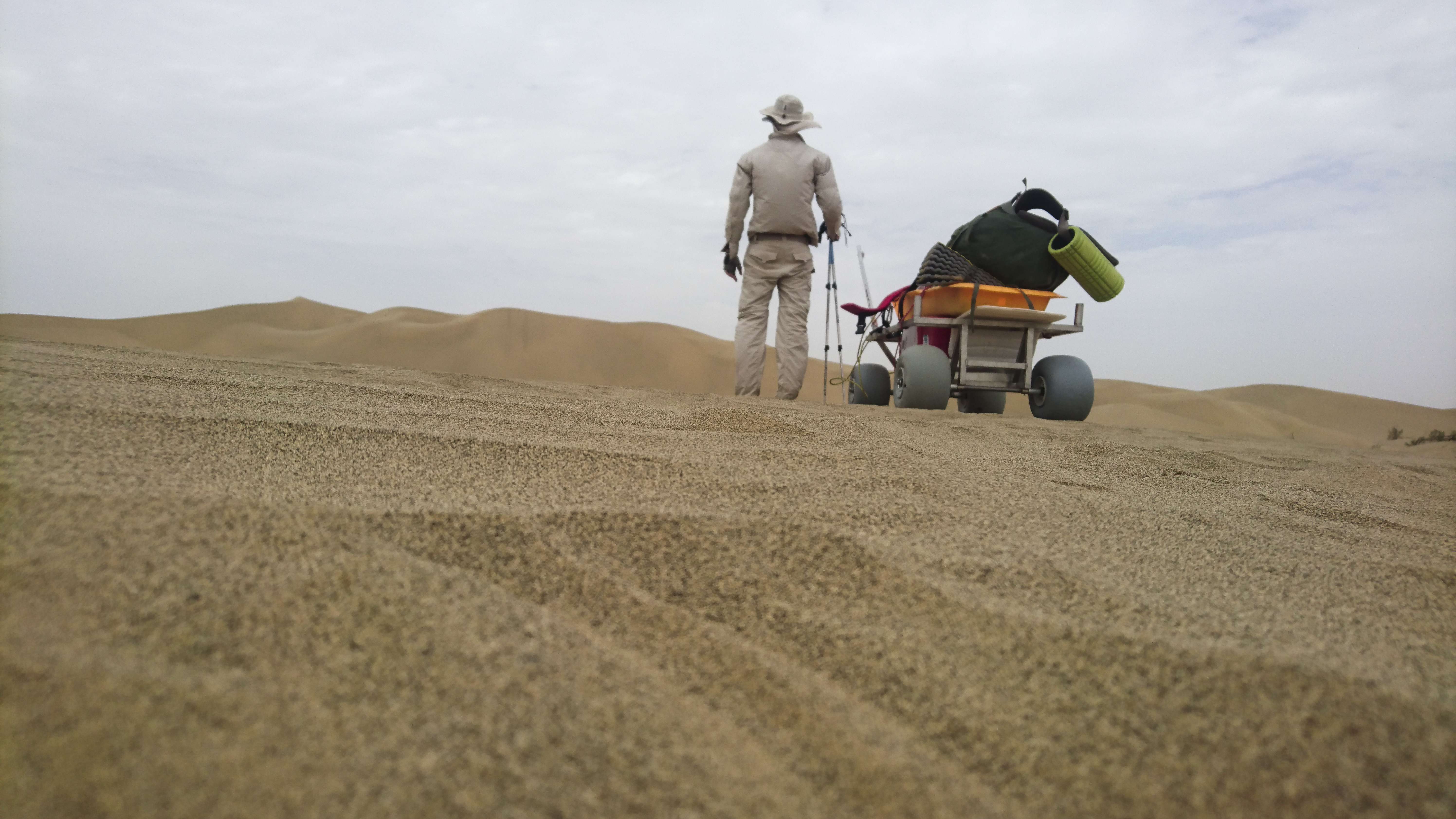 Rob Lilwall tries out the cart.