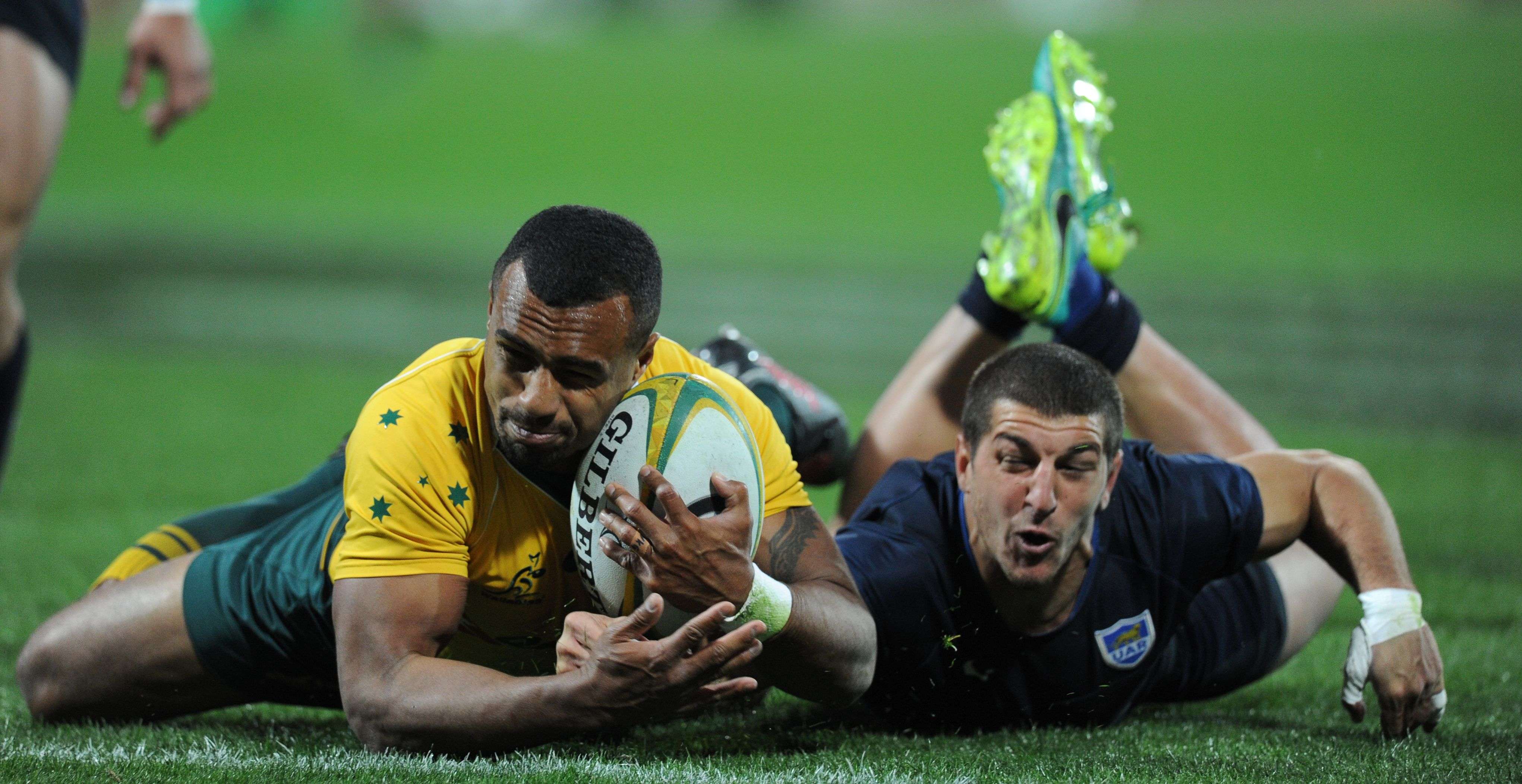Australia scrum half Will Genia, who had an outstanding game, scores against Argentina in the Rugby Championship match in Perth. Australia won 36-20. Photo: AFP