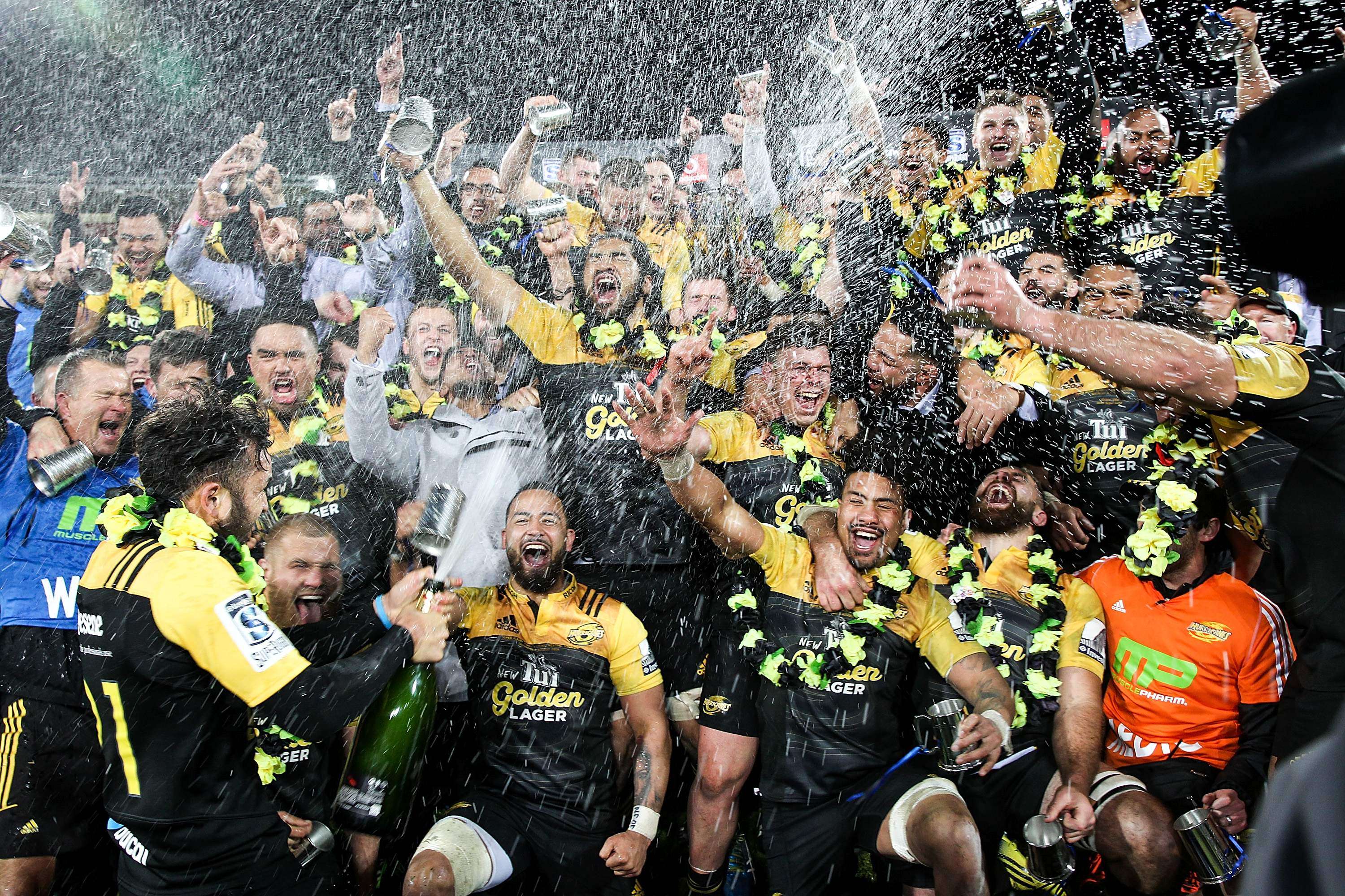 New Zealand's Hurricanes celebrate their victory after the Super Rugby final against the Lions of South Africa. Photo: AFP