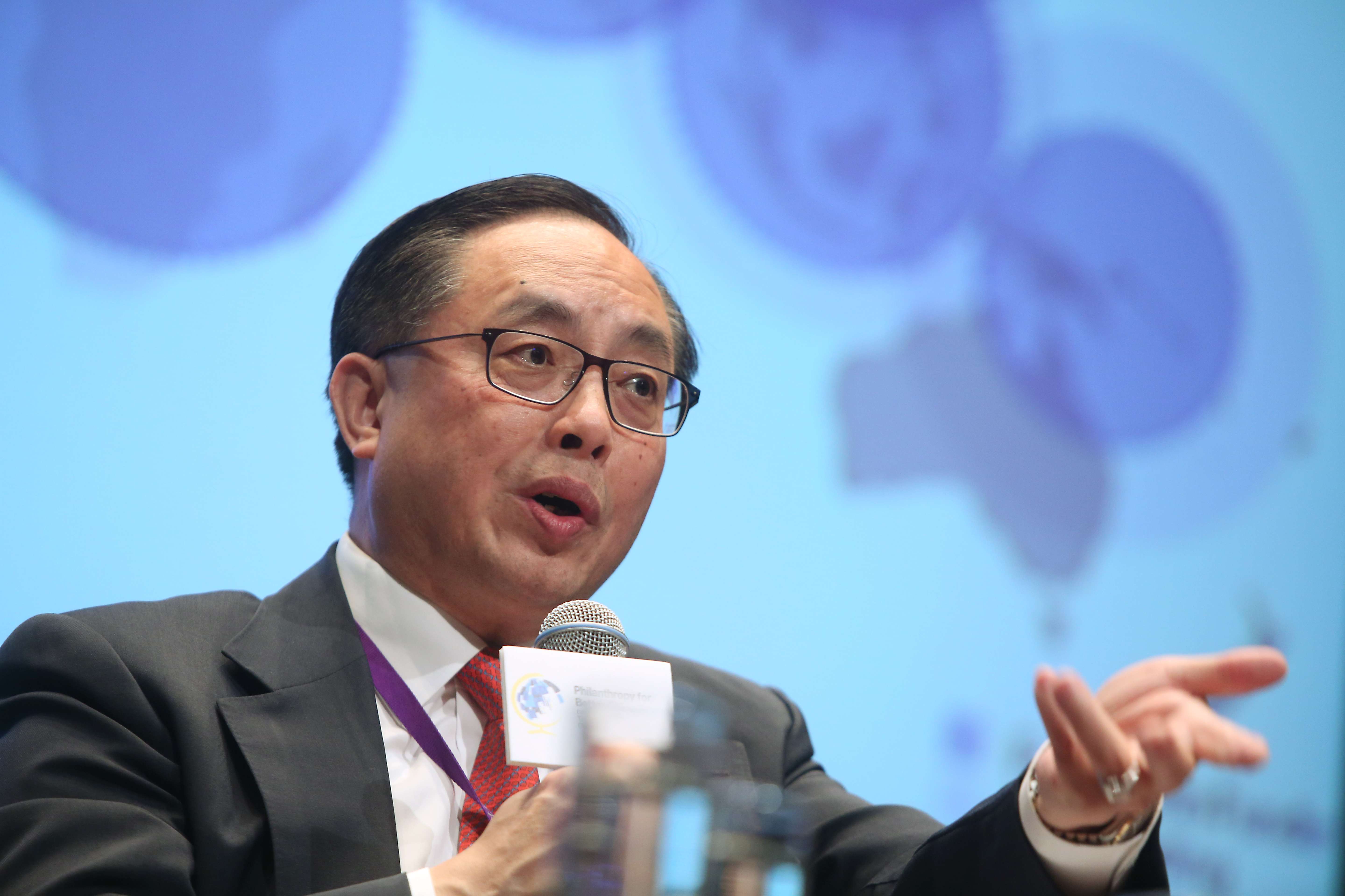 Hong Kong Secretary for Innovation and Technology Nicholas Yang Wei-hsiung spoke at the Philanthropy for Better Cities Forum at Hong Kong Convention and Exhibition Centre. Photo: Sam Tsang