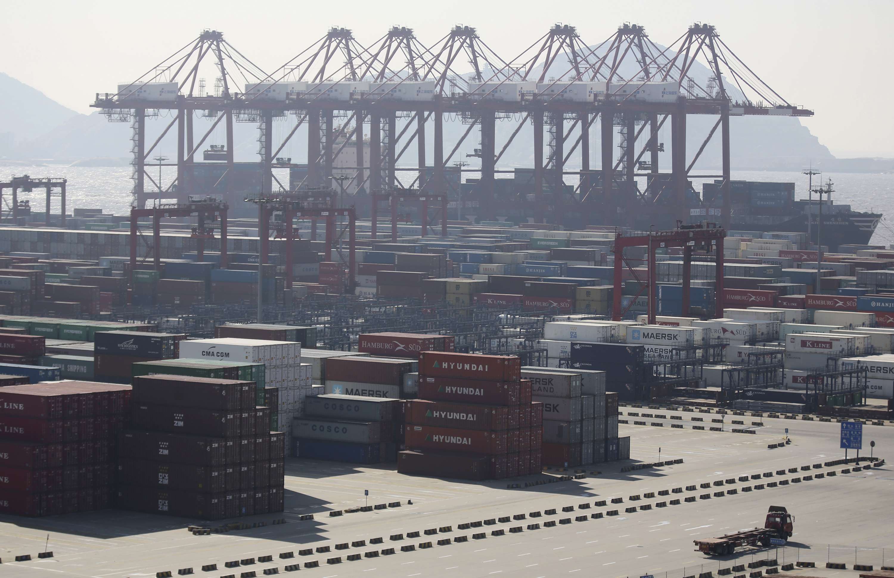 Shanghai International Port (Group) is among the half dozen cornerstone investors that have bought up 77 per cent of the shares in the recent initial public offer by the Postal Savings Bank of China. Photo: AP