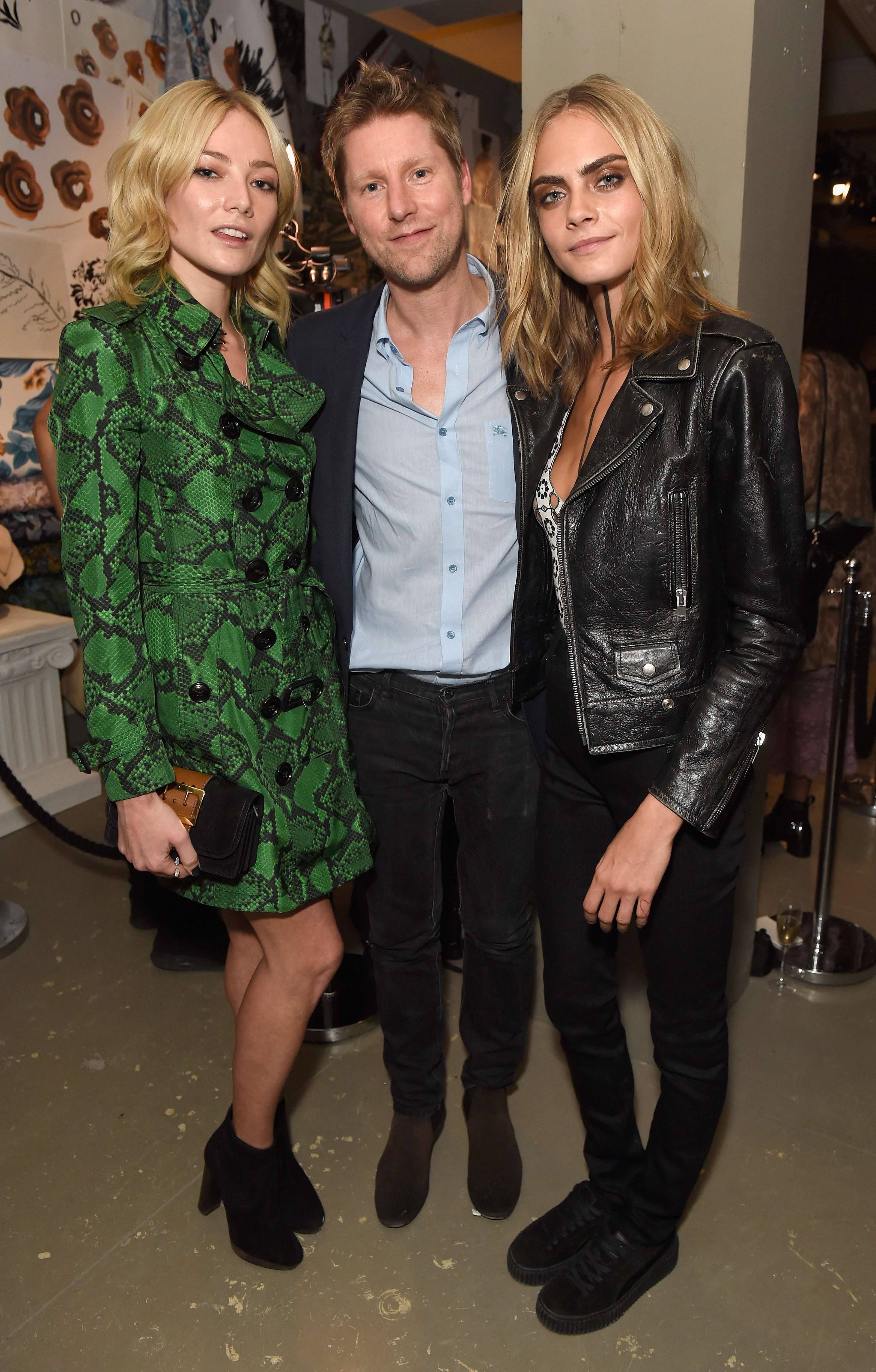 Clara Paget, Christopher Bailey and Cara Delevingne looking chic in Burberry at the September show.