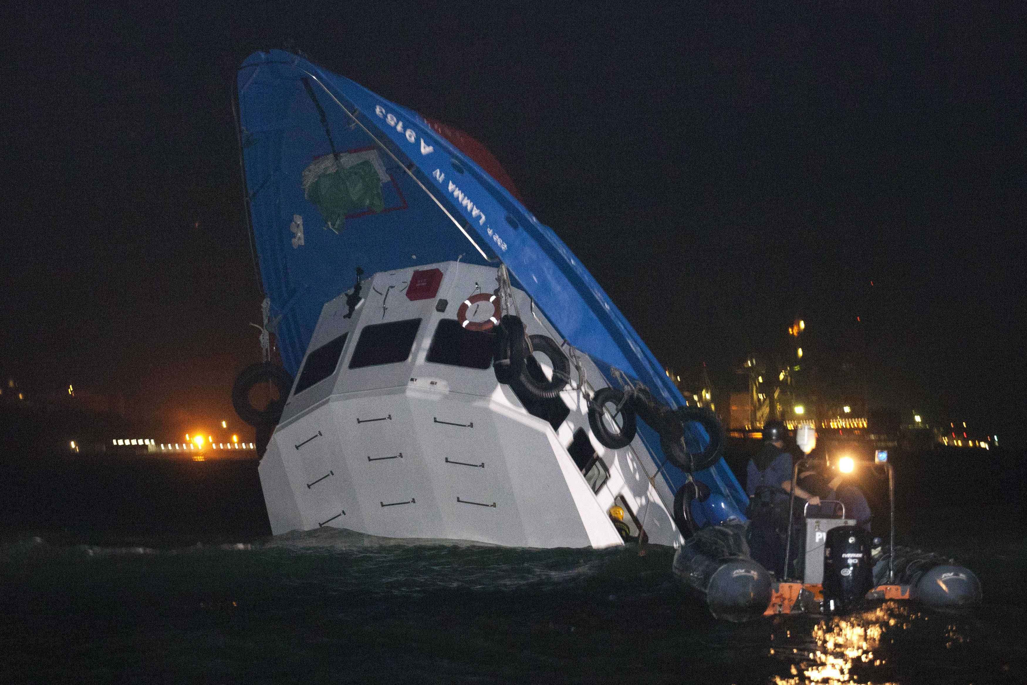 Rescuers approach the Lamma IV after the tragic collision on October 1, 2012. Photo: Reuters