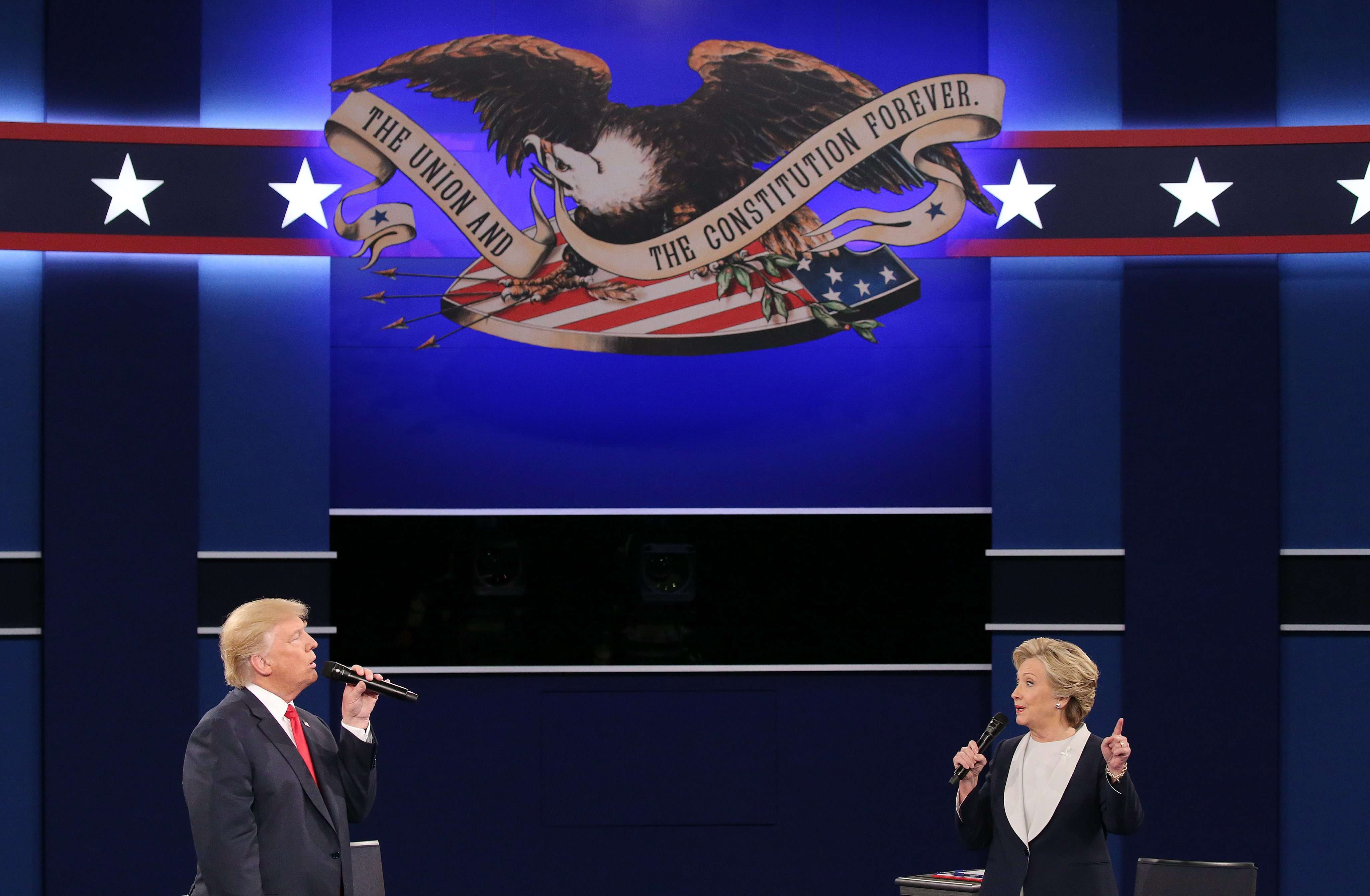 Republican Donald Trump and Democrat Hillary Clinton during the second presidential debate at Washington University in Missouri. Photo: EPA