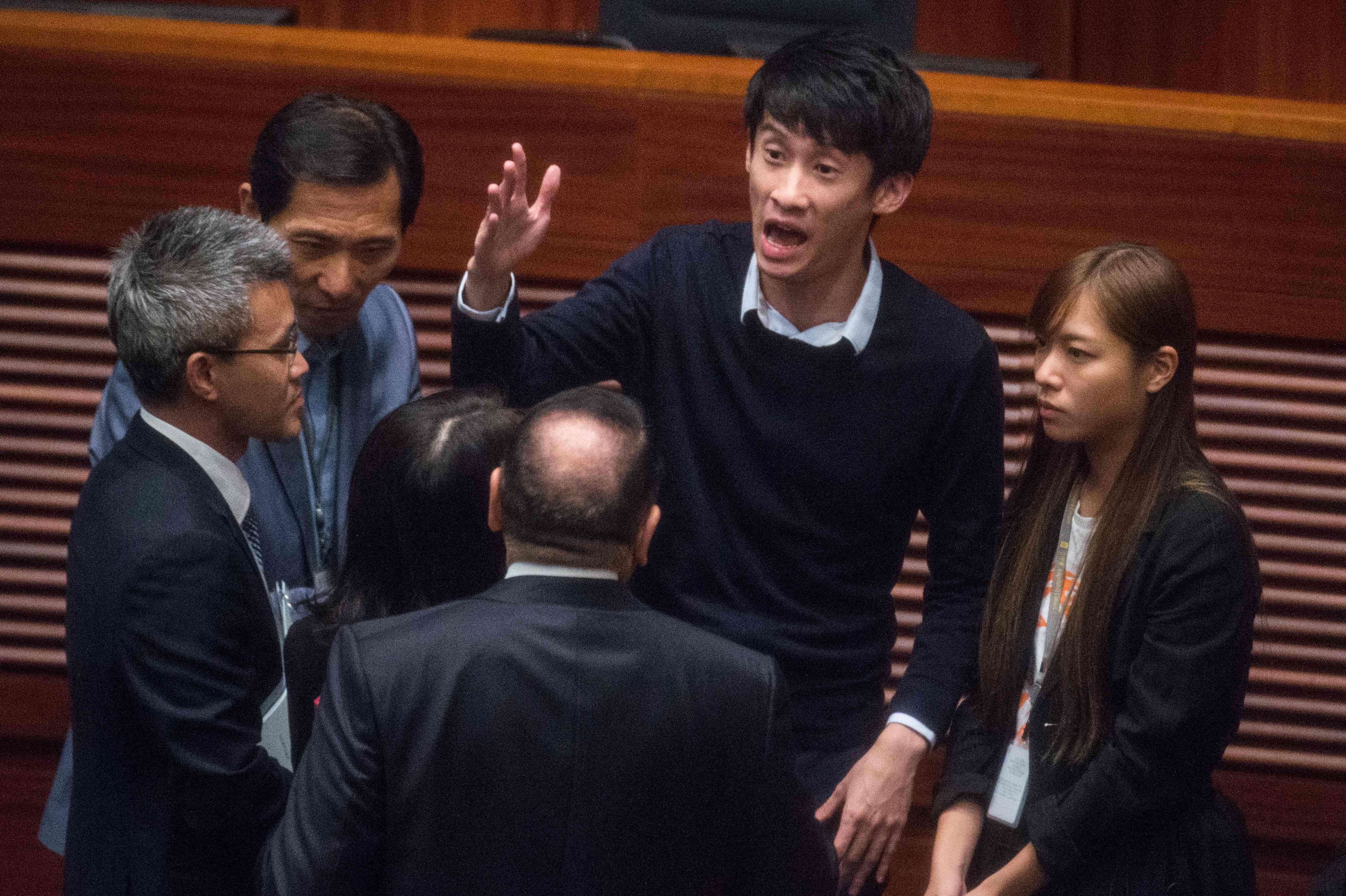 Lawmakers-elect Edward Yiu Chung-yim (back row left), “Baggio” Leung (centre, gesturing) and Yau Wai-ching (right) last Wednesday at Legco. Photo: AFP