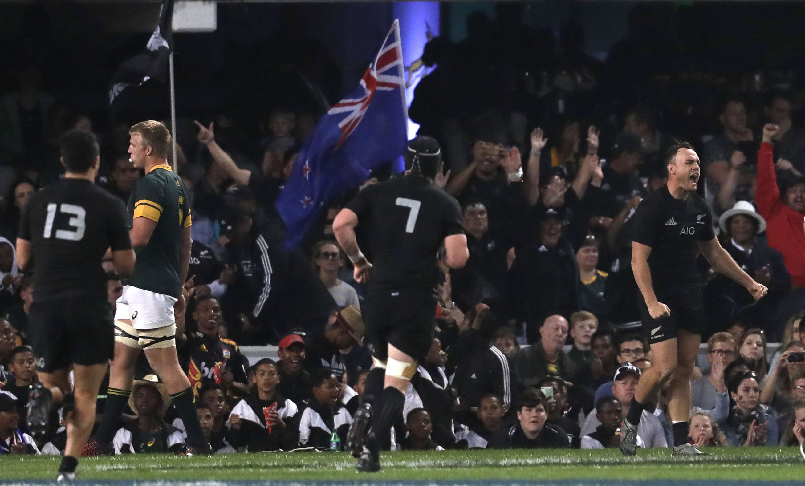 New Zealand’s Israel Dagg (right) reacts after scoring a try during the rugby championship match between South Africa and New Zealand. Photo: AP