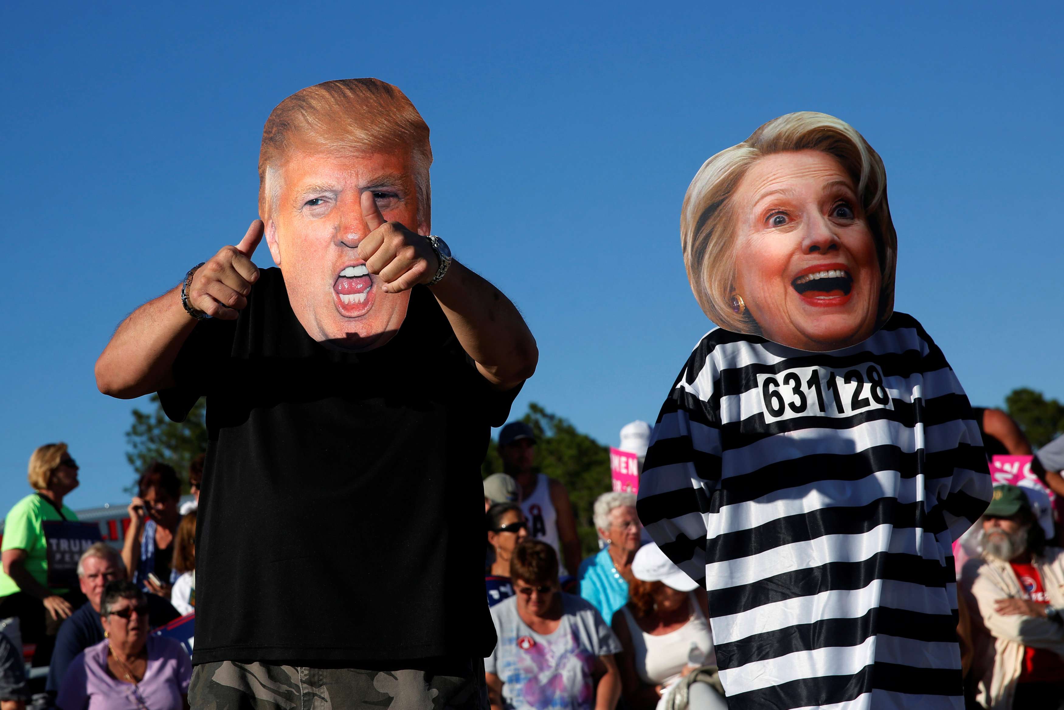 Supporters of Donald Trump make their feelings clear about US presidential rival Hillary Clinton at a campaign rally in Naples, Florida, on October 23. Photo: Reuters