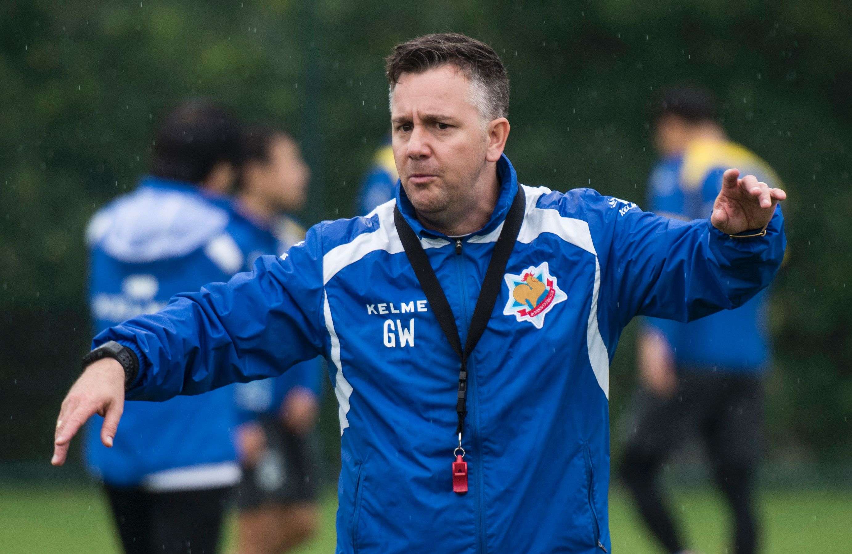 Gary White attending a practice session of the Shanghai Shenxin football club in Shanghai. AFP
