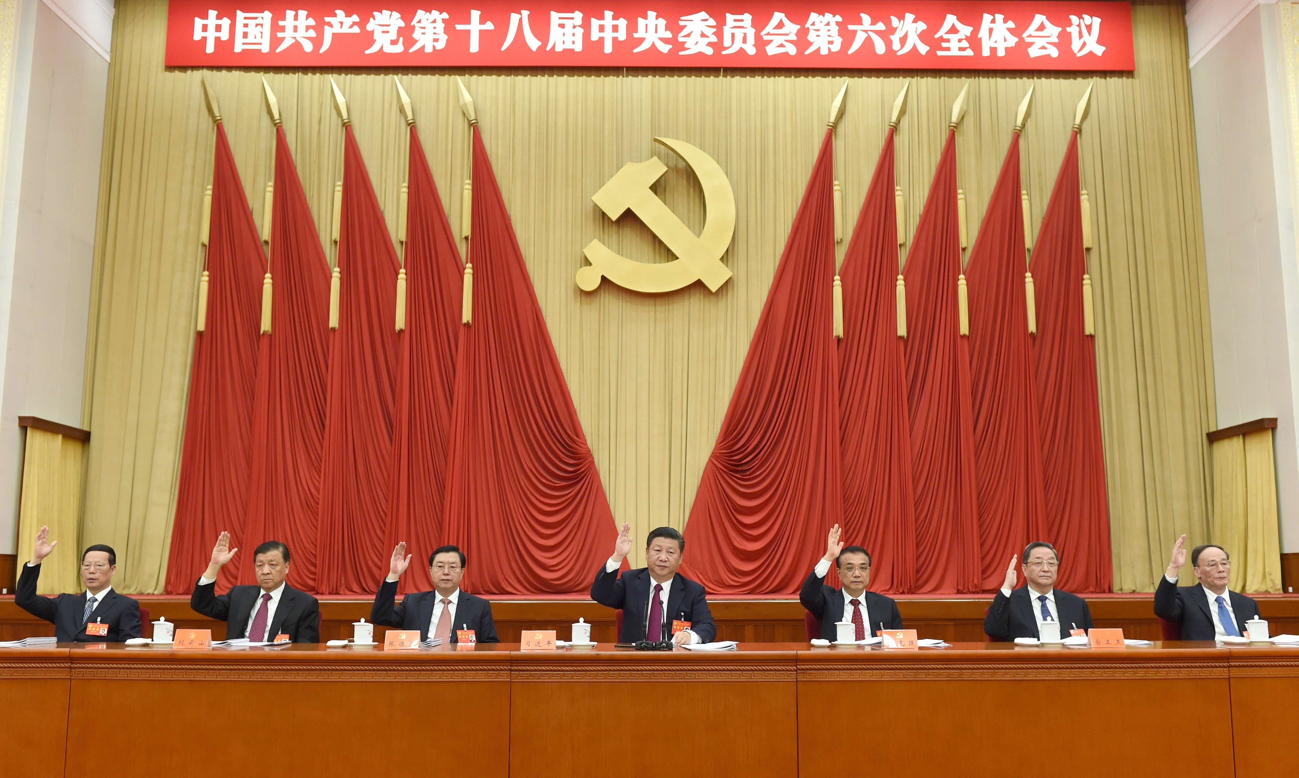 President Xi Jinping (centre), flanked by Premier Li Keqiang (right) and National People’s Congress Standing Committee chairman Zhang Dejiang, leads proceedings at the sixth plenum of the 18th party central committee in Beijing on October 27. Photo: Xinhua