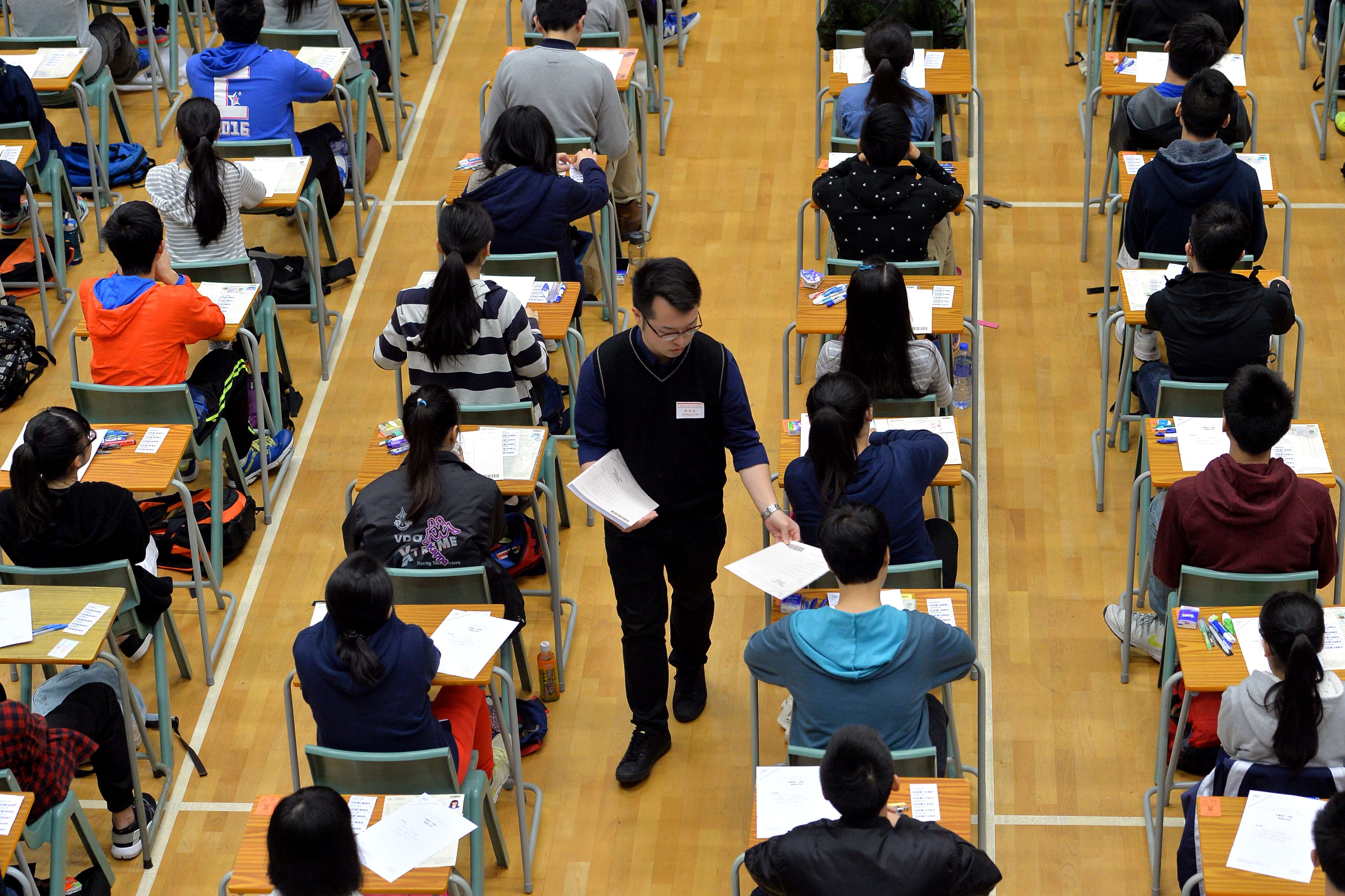 Students take the Hong Kong Diploma of Secondary Education examination at a Shek Kip Mei school. Is our education system failing to equip youngsters with life skills and self-reliance? Photo: SCMP Pictures