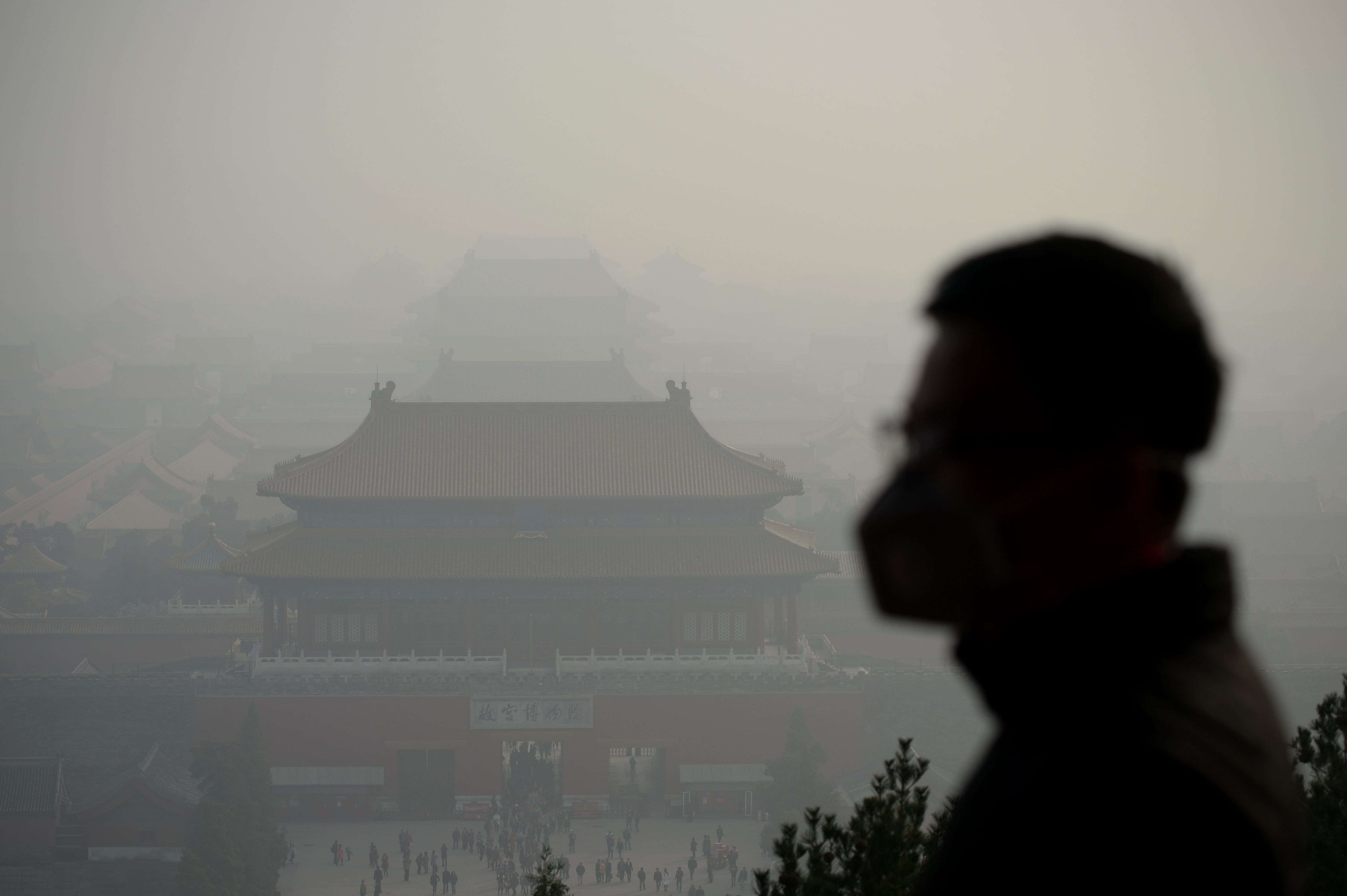 Beijing’s air quality index reading hit 220 at noon on Wednesday – far above the heathy level of 25 for daily exposure stipulated by the World Health Organisation. Photo: AFP