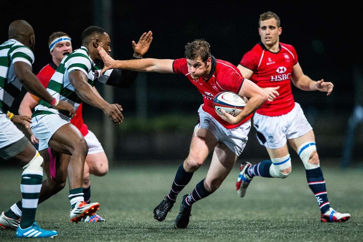 First-time Hong Kong captain Ed Rolston attacks against Zimbabwe in the 2015 Cup of Nations. Photos: SCMP Pictures
