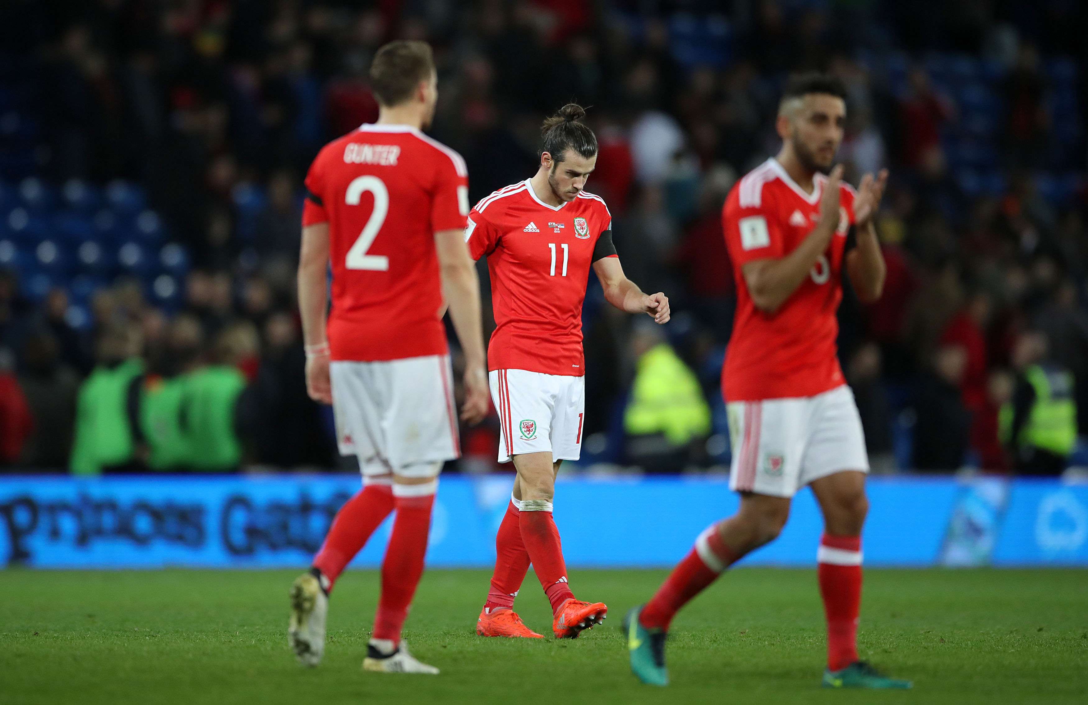 Wales’ Gareth Bale (centre) leaves the pitch after the final whistle of the 2018 World Cup group D qualifier. Photo: AP