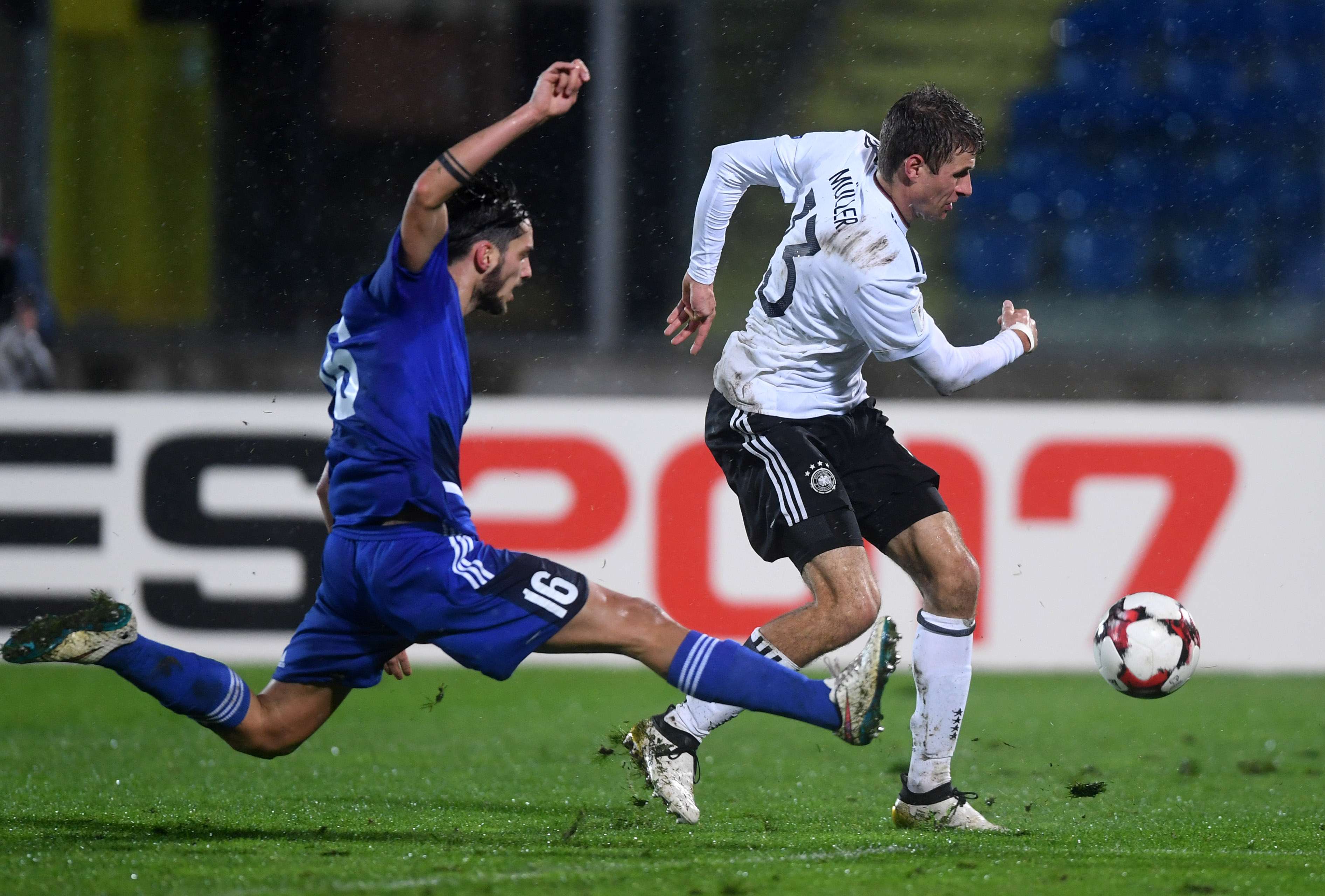 Germany’s Thomas Muller races away from San Marino’s Davide Cesarini during their 2018 World Cup group C qualifier at the Serravalle stadium in San Marino on Friday night. Photo: Xinhua