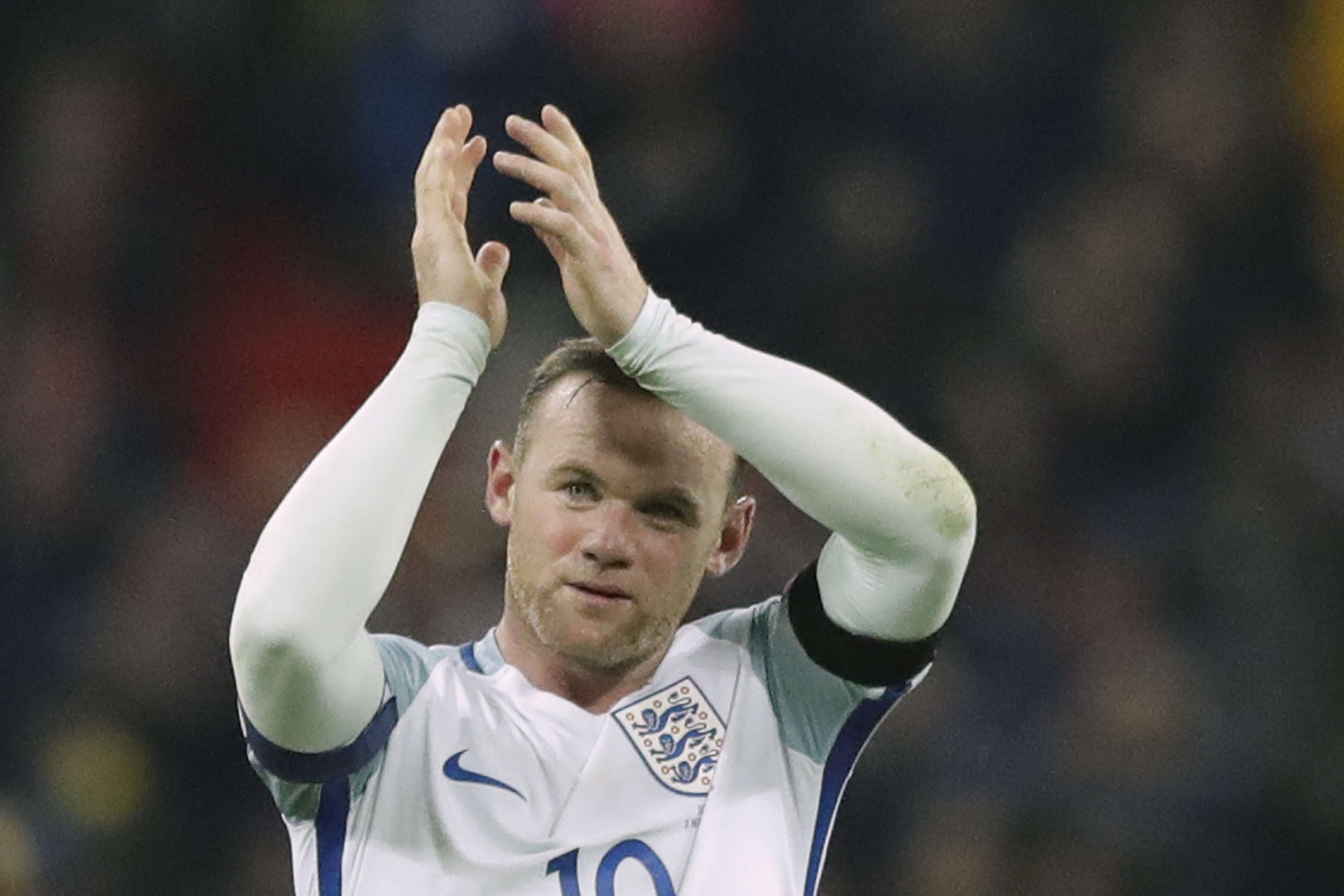 England's Wayne Rooney . (AP Photo/Matt Dunham)