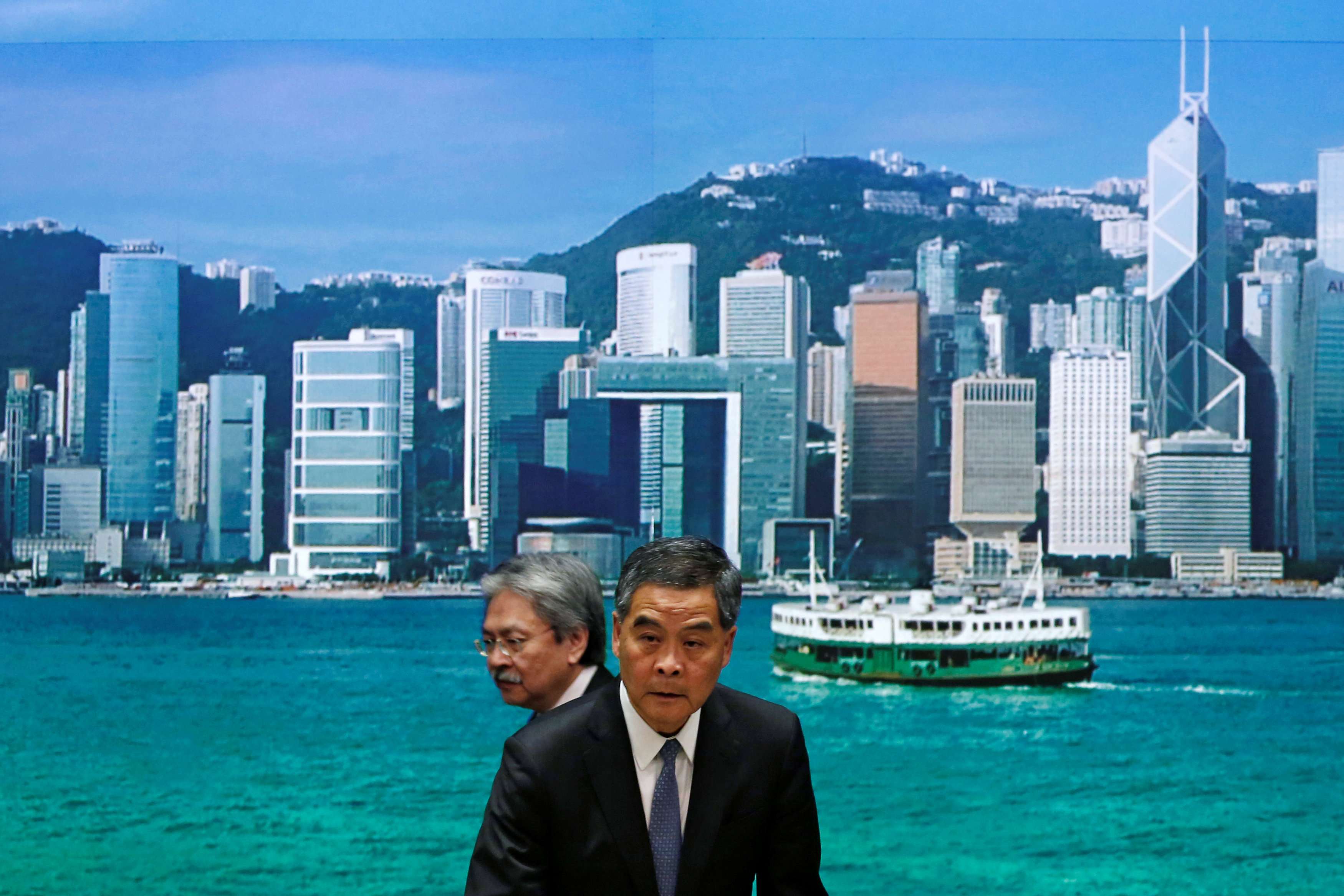 Hong Kong Chief Executive Leung Chun-ying and Financial Secretary John Tsang attend a news conference earlier this month. If President Xi Jinping and his camp were in favour of the so-called “tough as steel” Leung, the chief executive would have tossed his hat in the ring long ago. Photo: Reuters