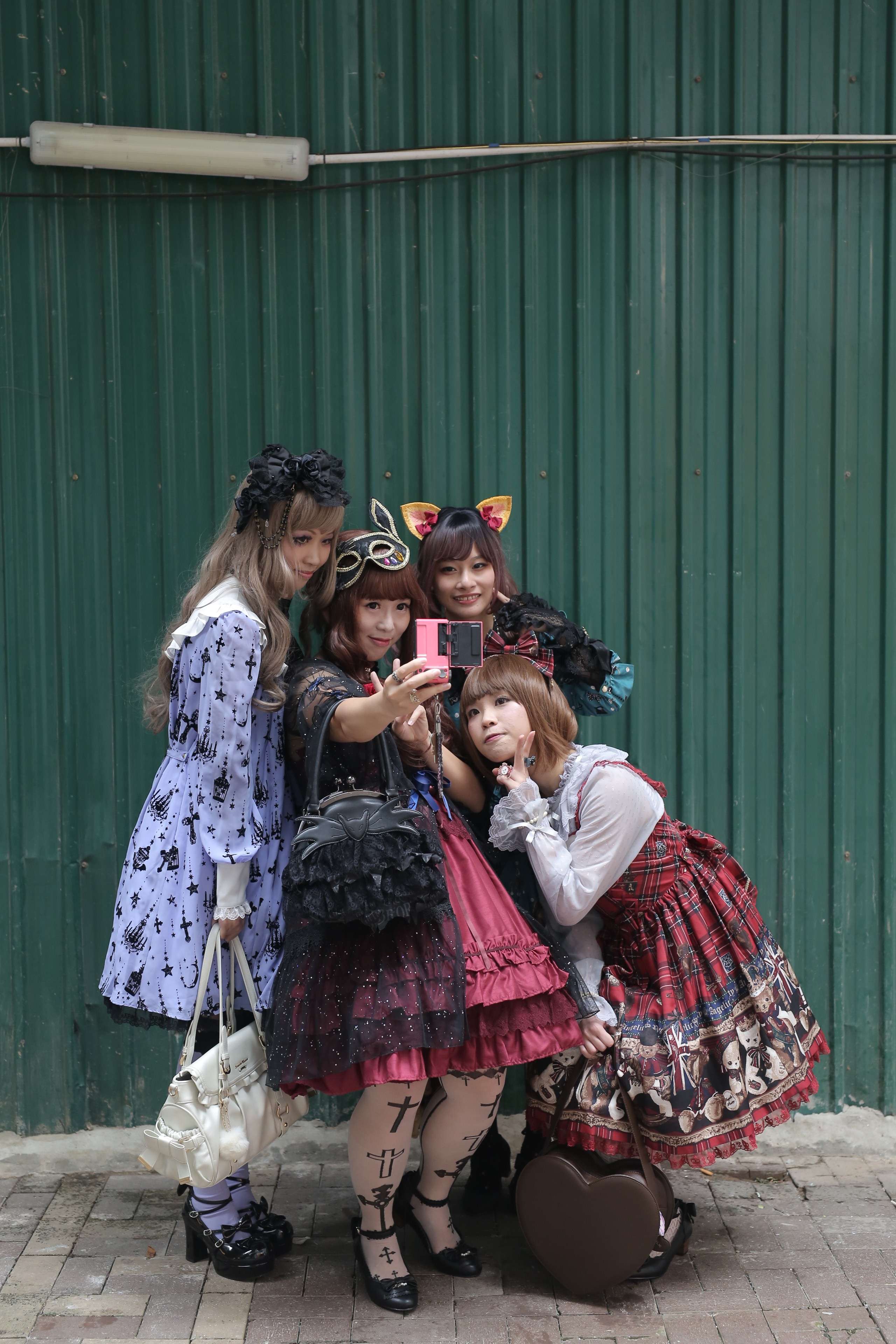 Hong Kong Lolitas (from left) Clara Lau, Angela Leung, Sammi Wong and Kat Wong in Causeway Bay. Picture: Paul Yeung