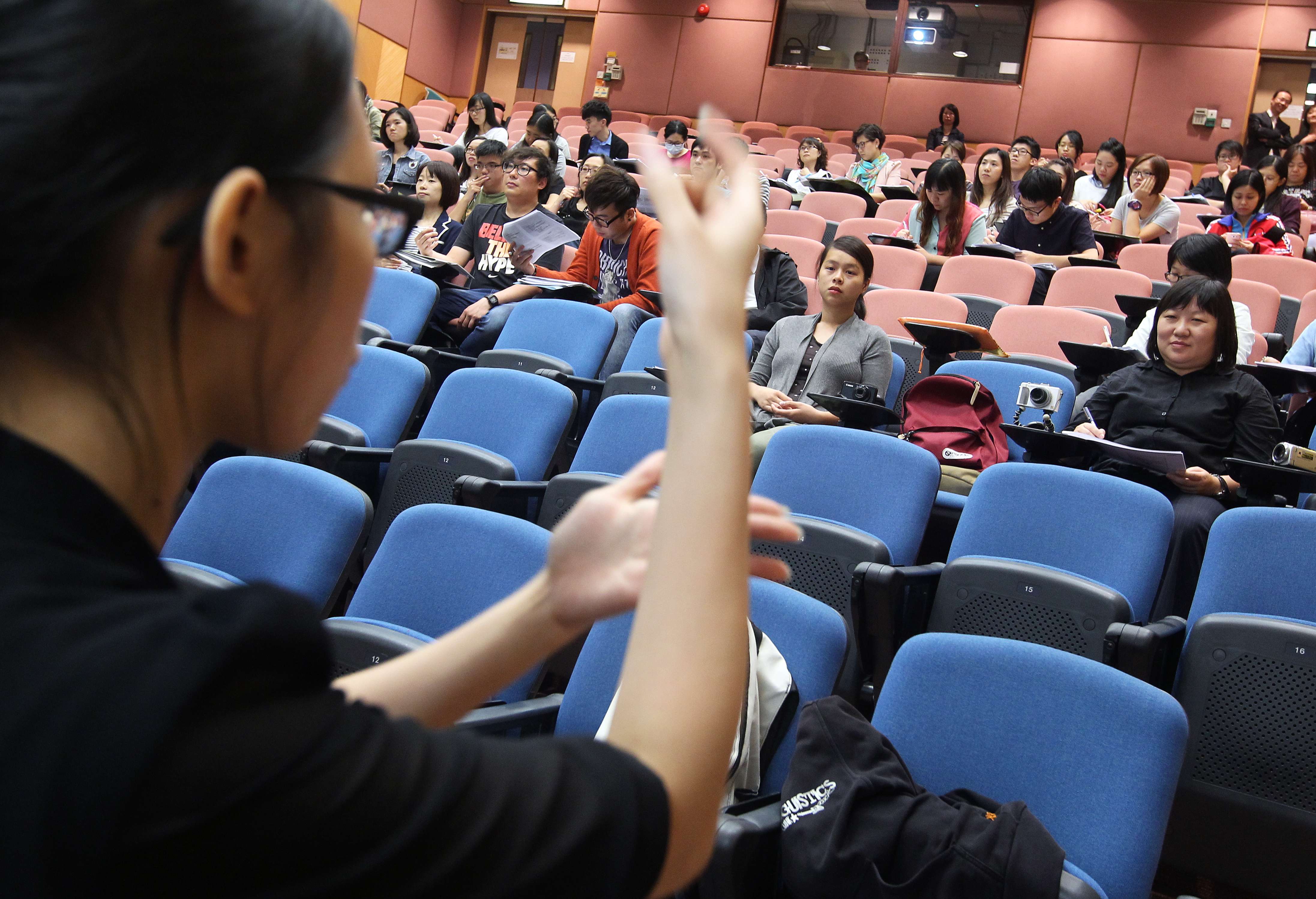 Two hearing-impaired students attend a lecture in 2013 at the then Hong Kong Institute of Education (now renamed Education University), studying for a bachelor’s degree in special needs education. Photo: Jonathan Wong