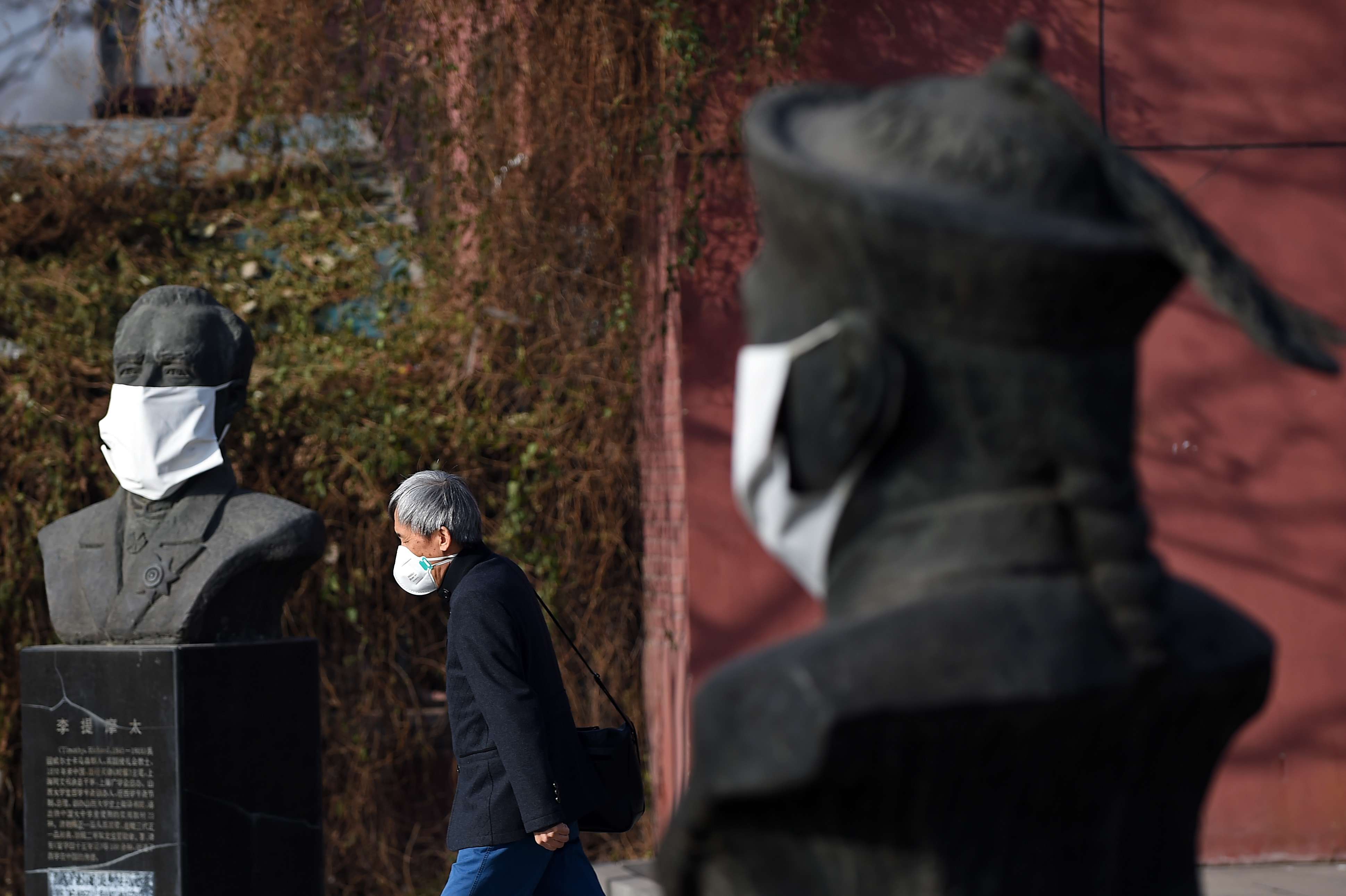 Masks protecting against pollution are a common sight in China, the world’s largest carbon emitter. Photo: China News Service