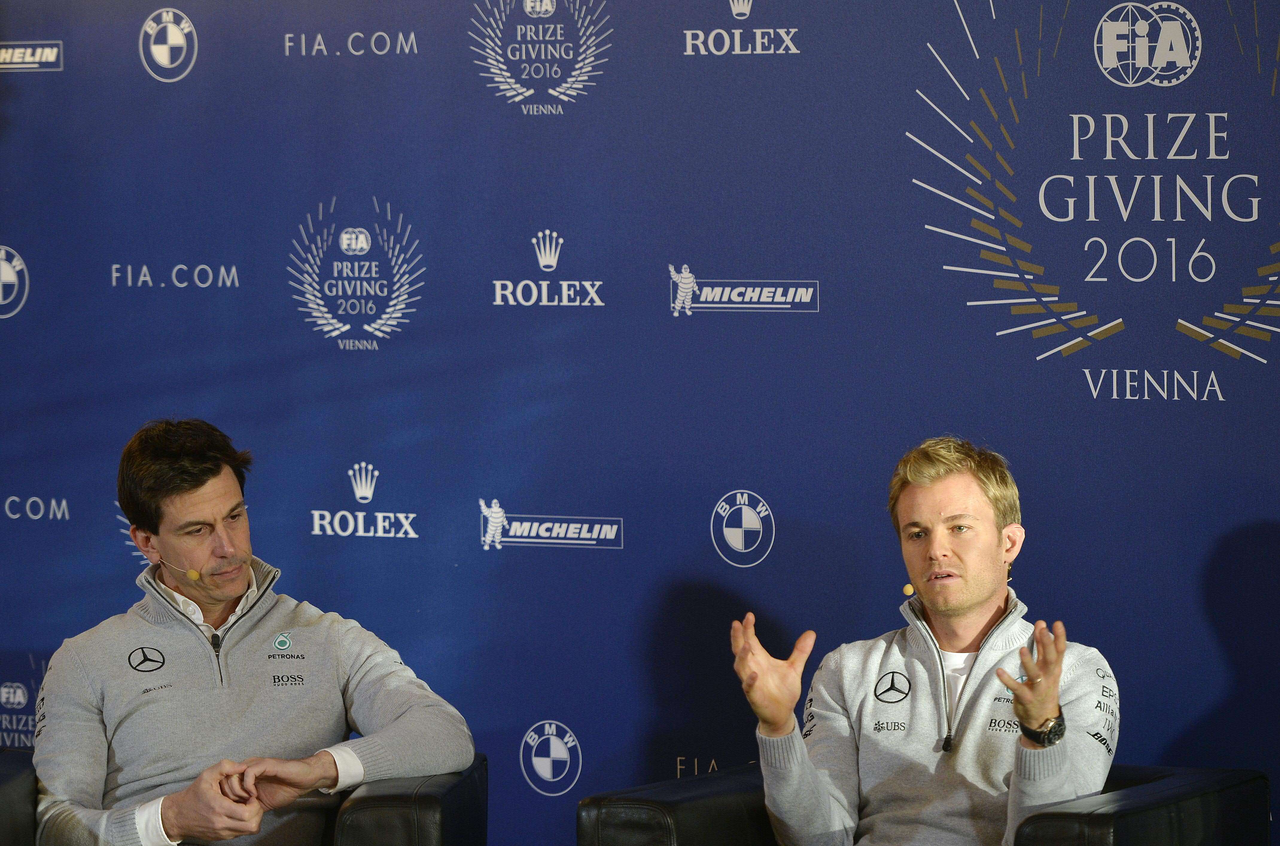 Formula One world champion Nico Rosberg sits next to his Mercedes boss Toto Wolff as he gives a press conference where he announced his retirement from the sport. Photo: AFP
