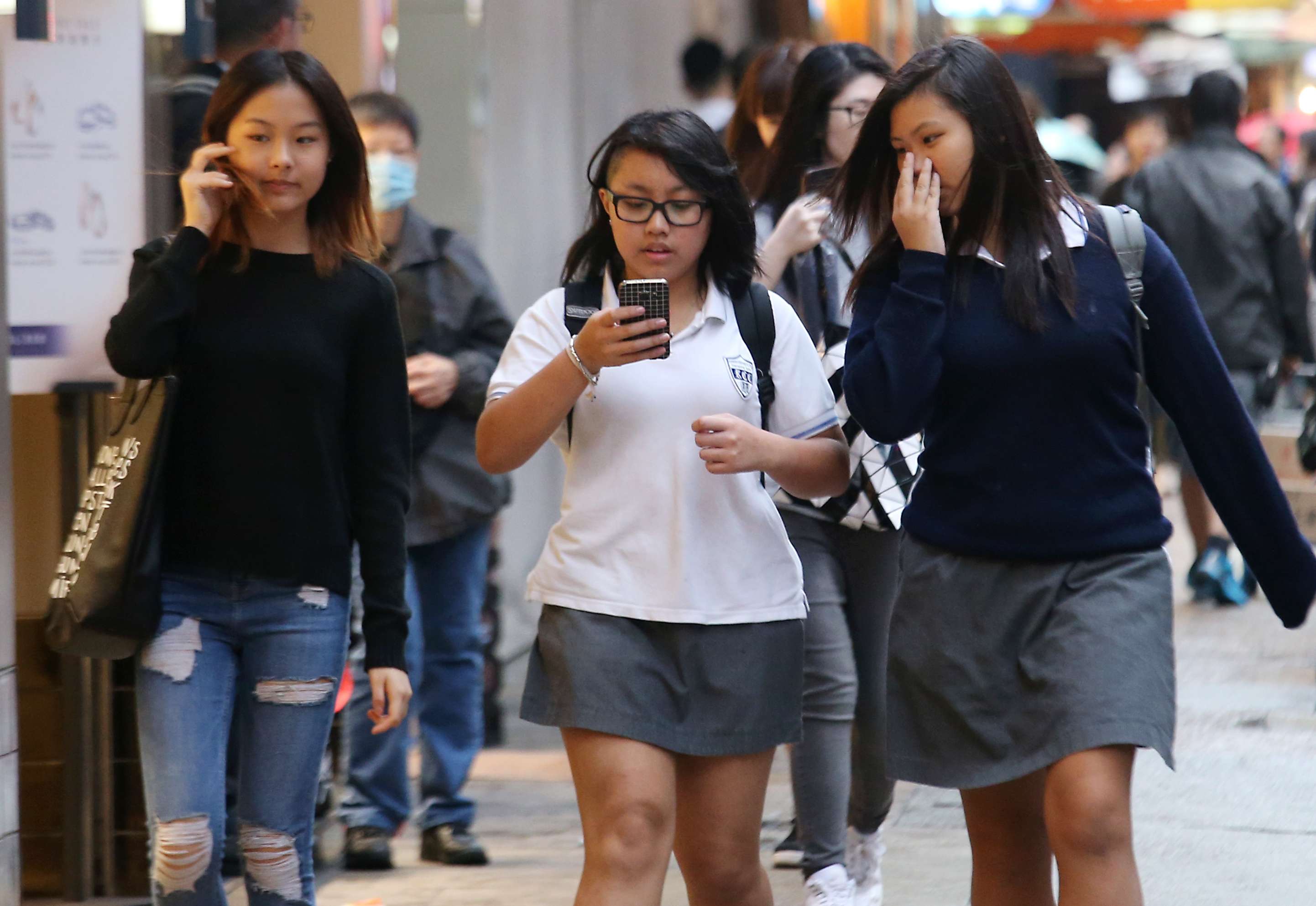 Young students in Causeway Bay on November 23. Hong Kong has yet to develop a central guiding principle for youth development. Photo: David Wong