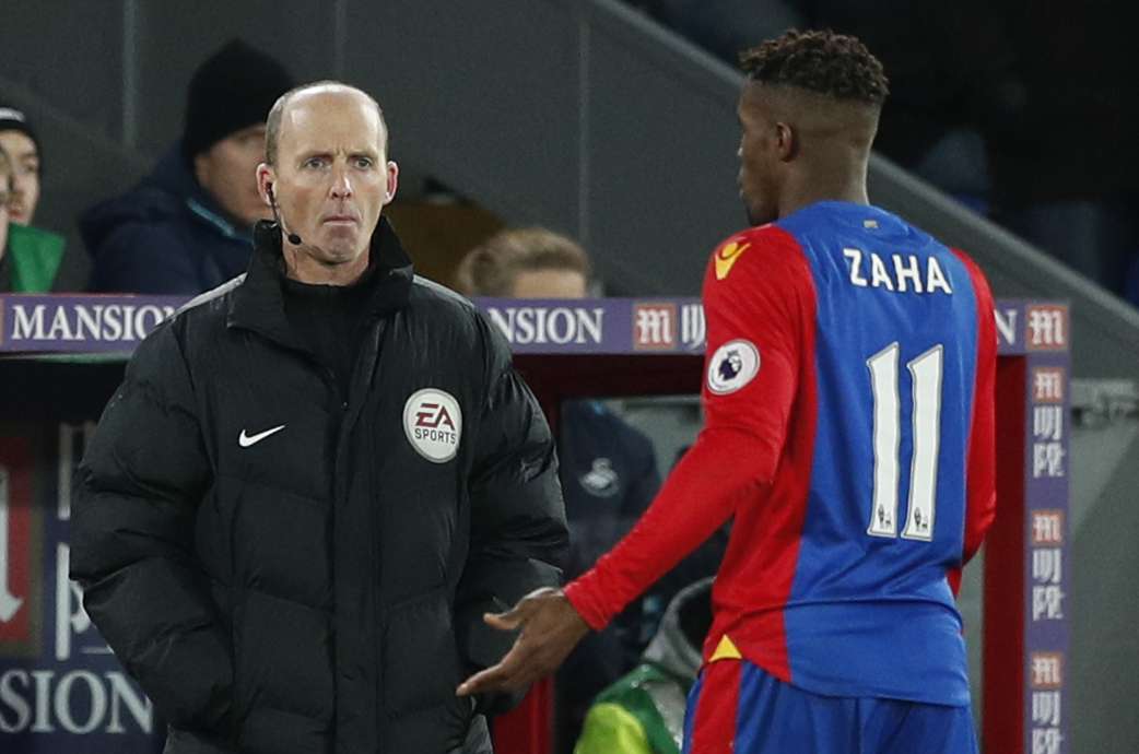 Premier League official Mike Dean often takes up the role of pantomime bad guy. Photo: Reuters