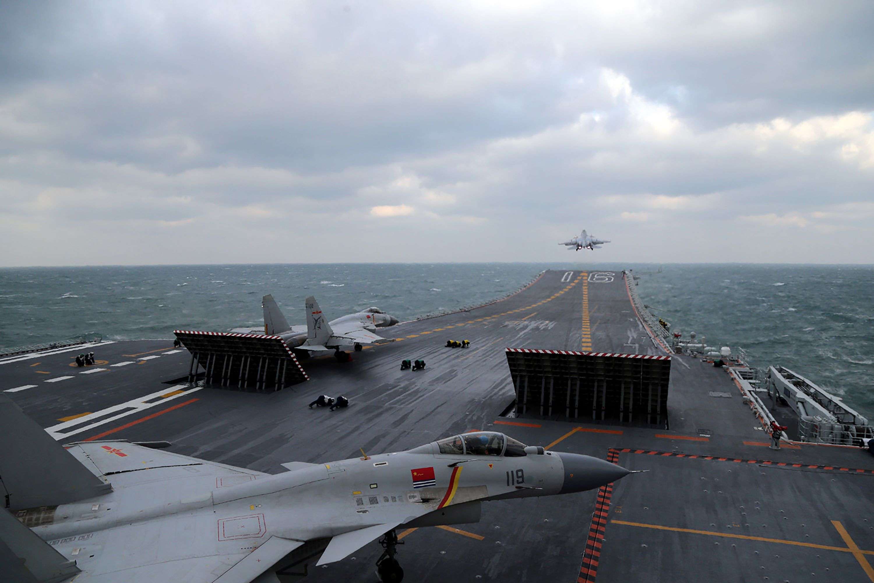 Chinese J-15 fighter jets ready for take-off from the deck of the Liaoning aircraft carrier during military drills in the East China Sea. Photo: AFP