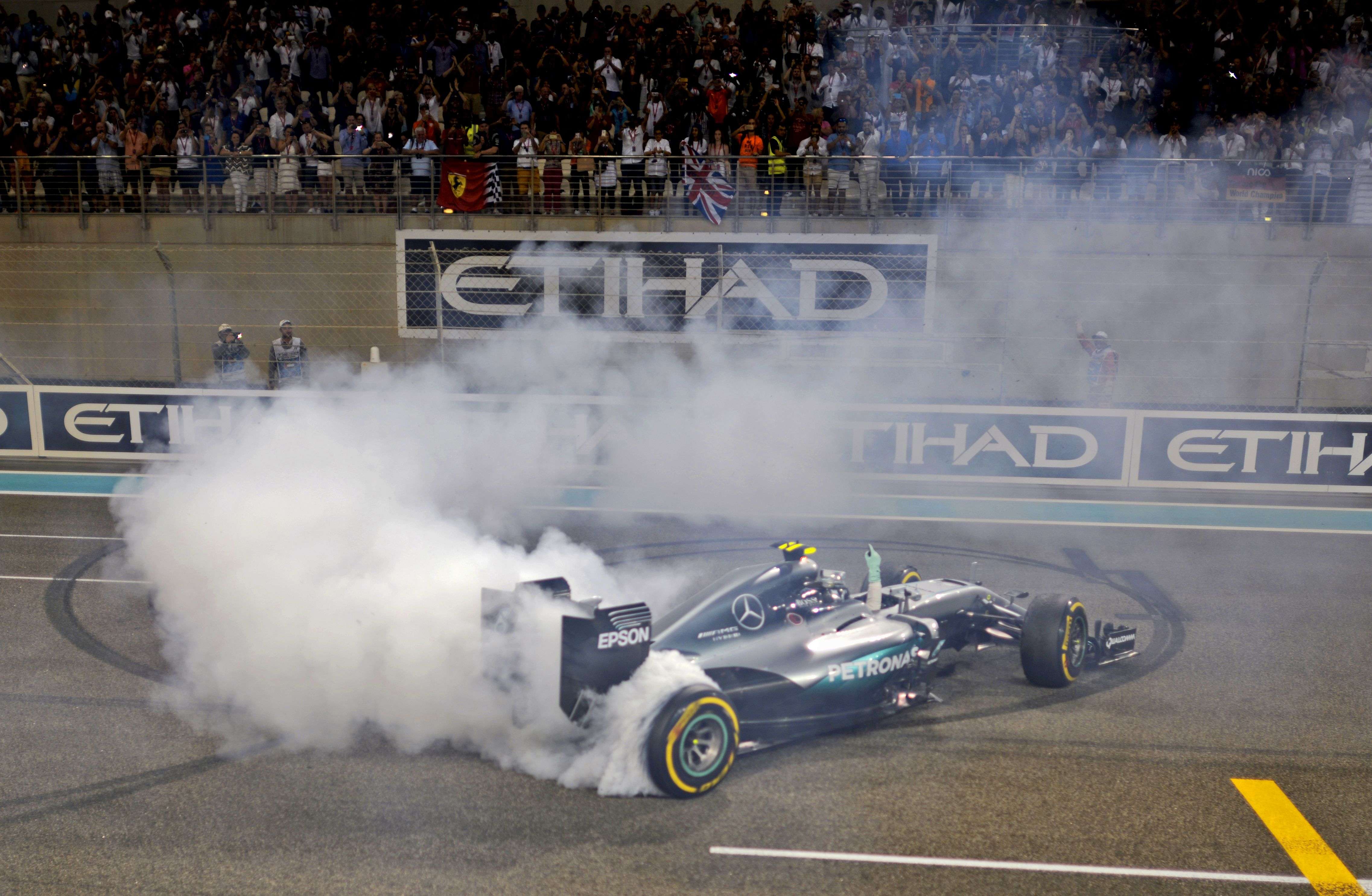 German driver Nico Rosberg celebrating at the end of the Abu Dhabi Formula One Grand Prix at the Yas Marina circuit. Photo: AFP