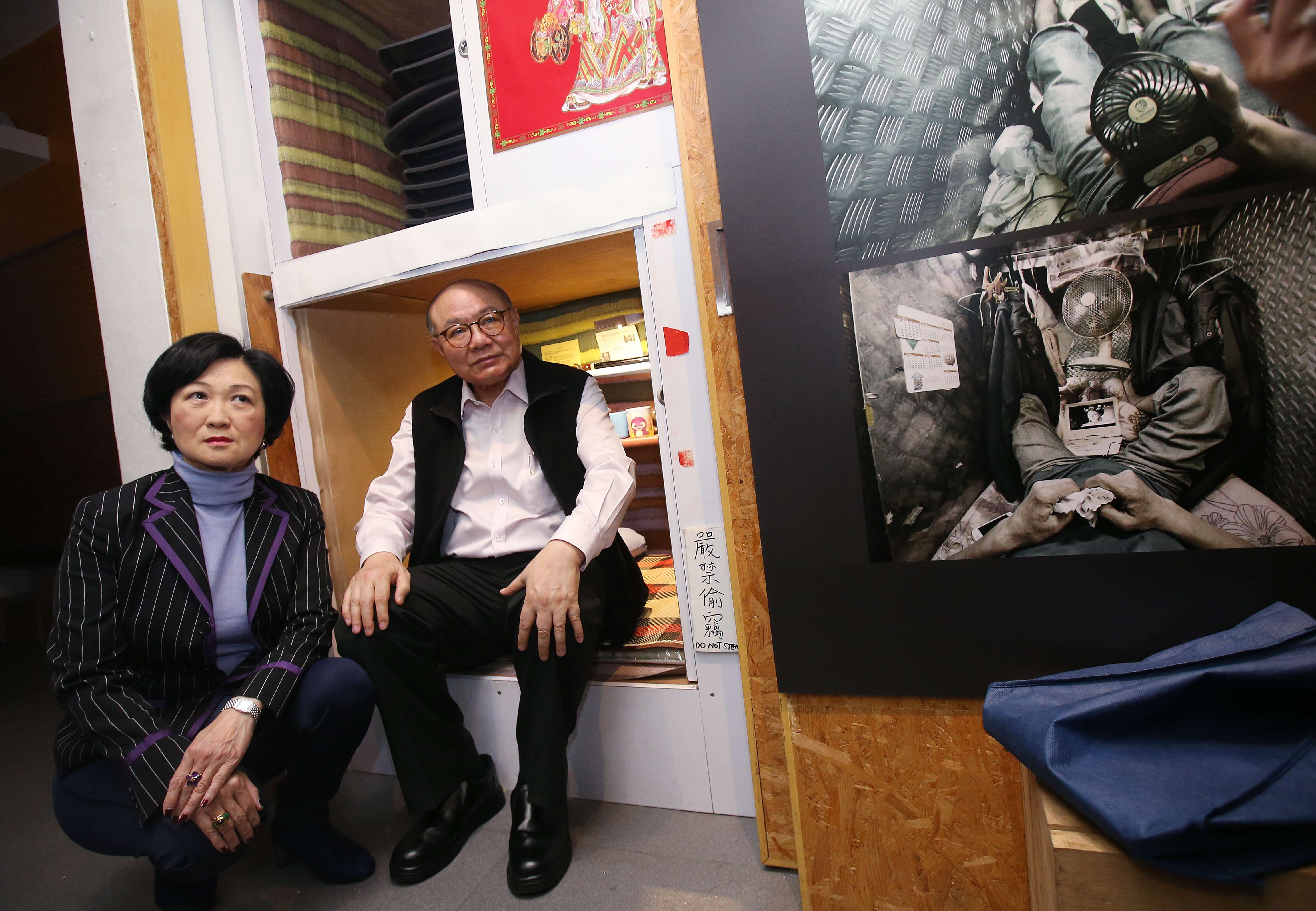 Regina Ip Lau Suk-yee (left) and Woo Kwok-hing at an earlier exhibition organised by the Society for Community Organisation in Sham Shui Po, highlighting the appalling living conditions of some locals. Photo: David Wong