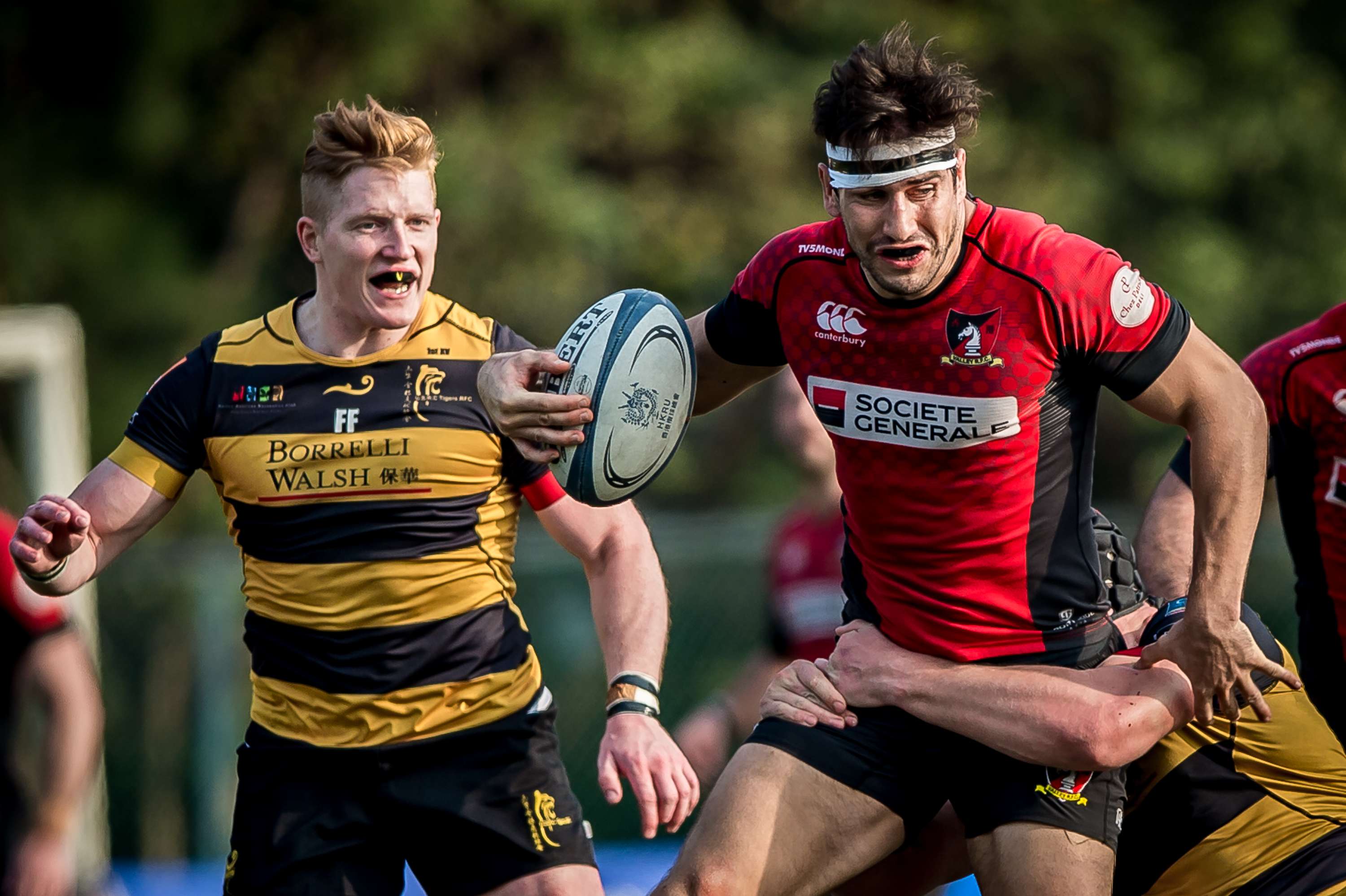 Valley’s Ally Maclay takes on the tackler in his side’s draw with Tigers in the Hong Kong Premiership. Photo: HKRU