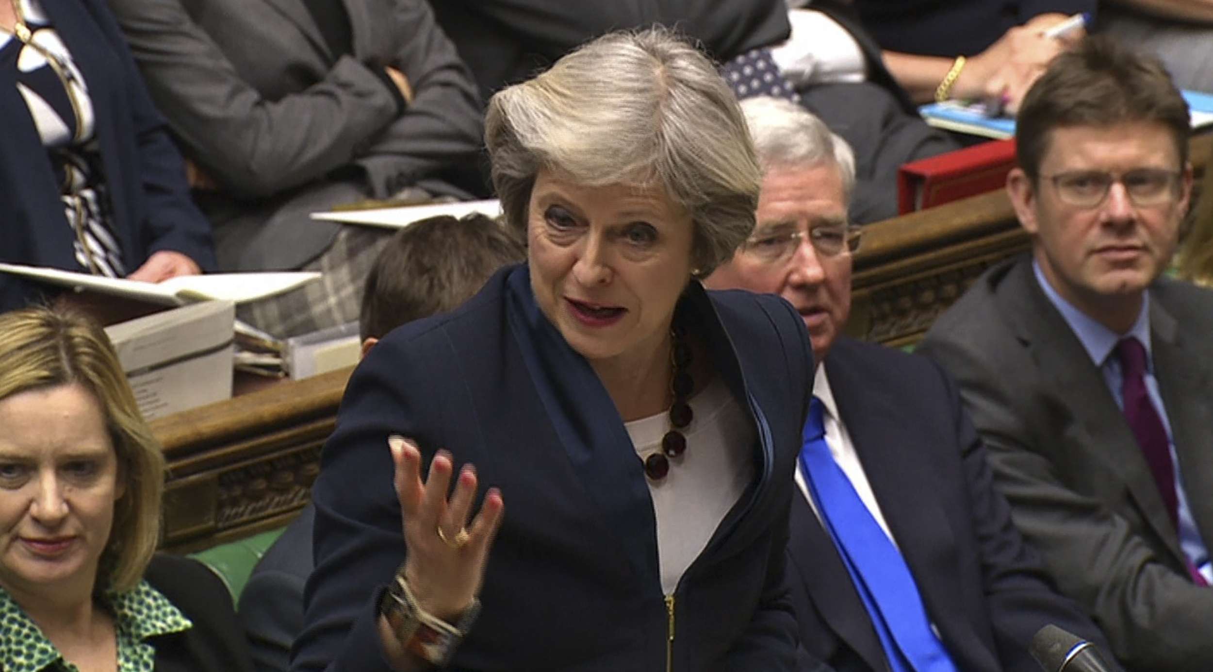 British Prime Minister Theresa May answers questions in the House of Commons. Photo: AFP