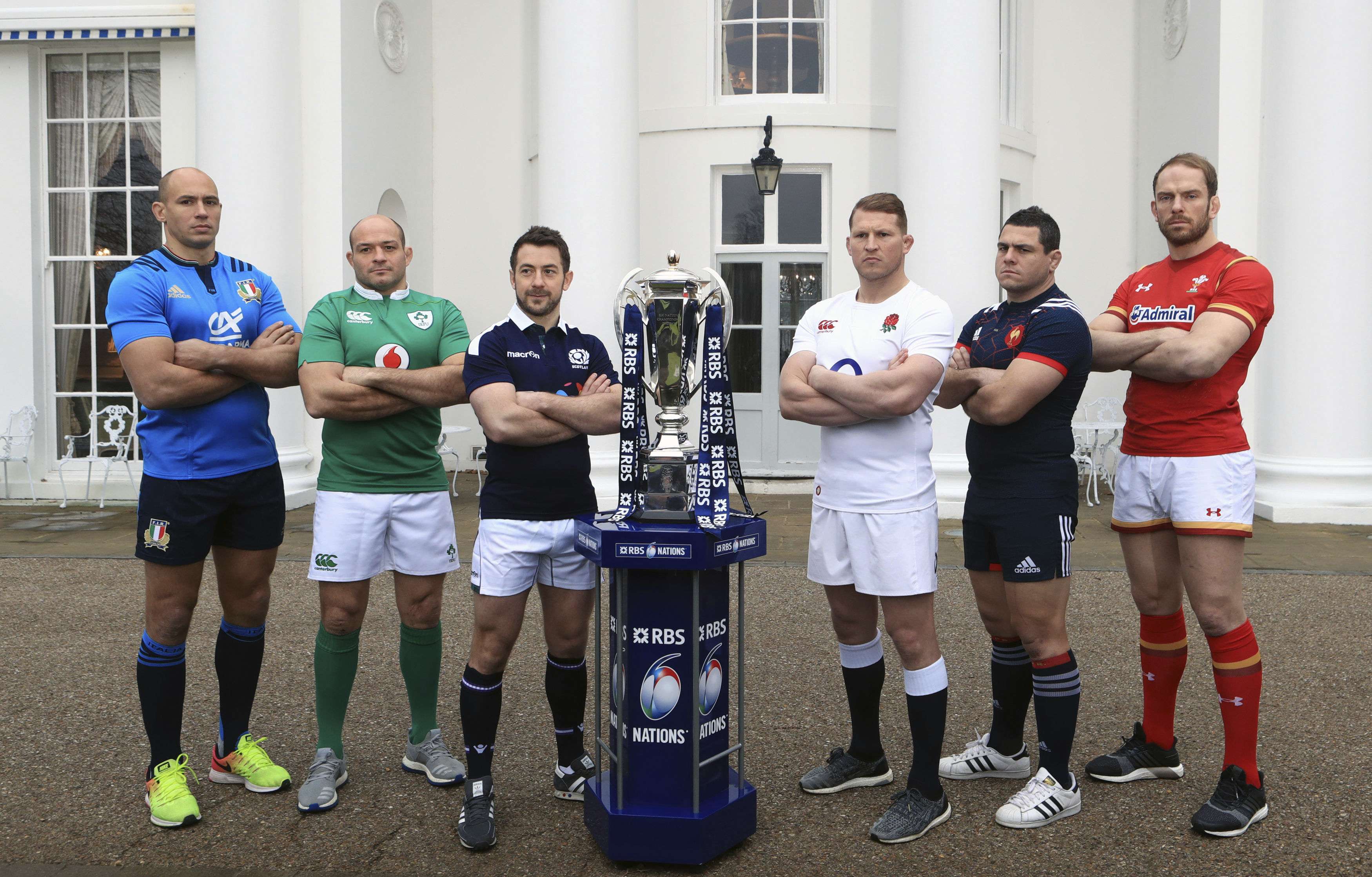 (From left to right) Italy captain Sergio Parisse, Ireland captain Rory Best, Scotland captain Greig Laidlaw, England captain Dylan Hartley, France captain Guilhem Guirado and Wales captain Alun Wyn Jones pose next to the Six Nations Championship trophy. Photo: AP