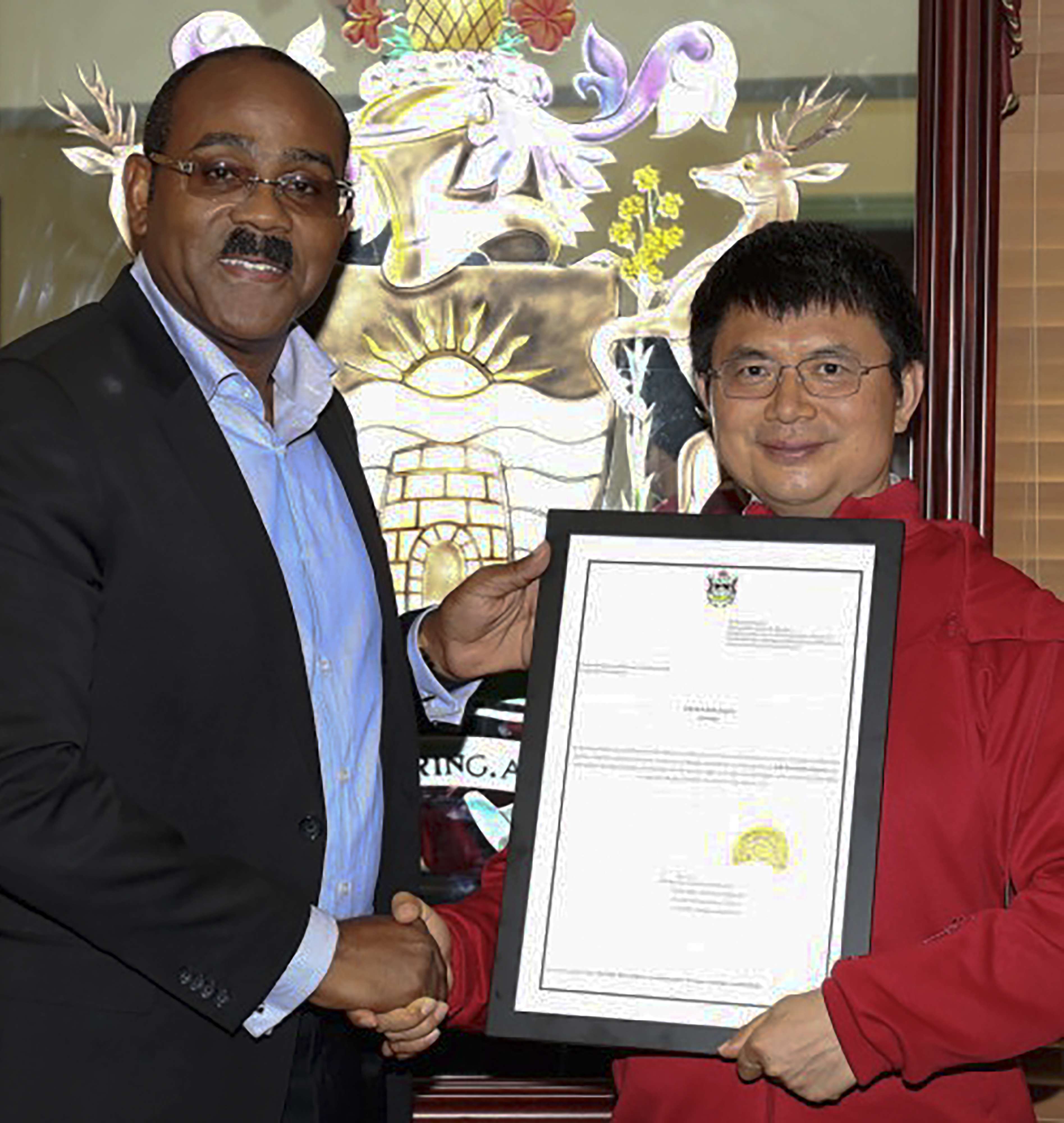 Prime Minister of Antigua and Barbuda Gaston Browne, left, with Xiao Jianhua in 2015. Photo: Handout