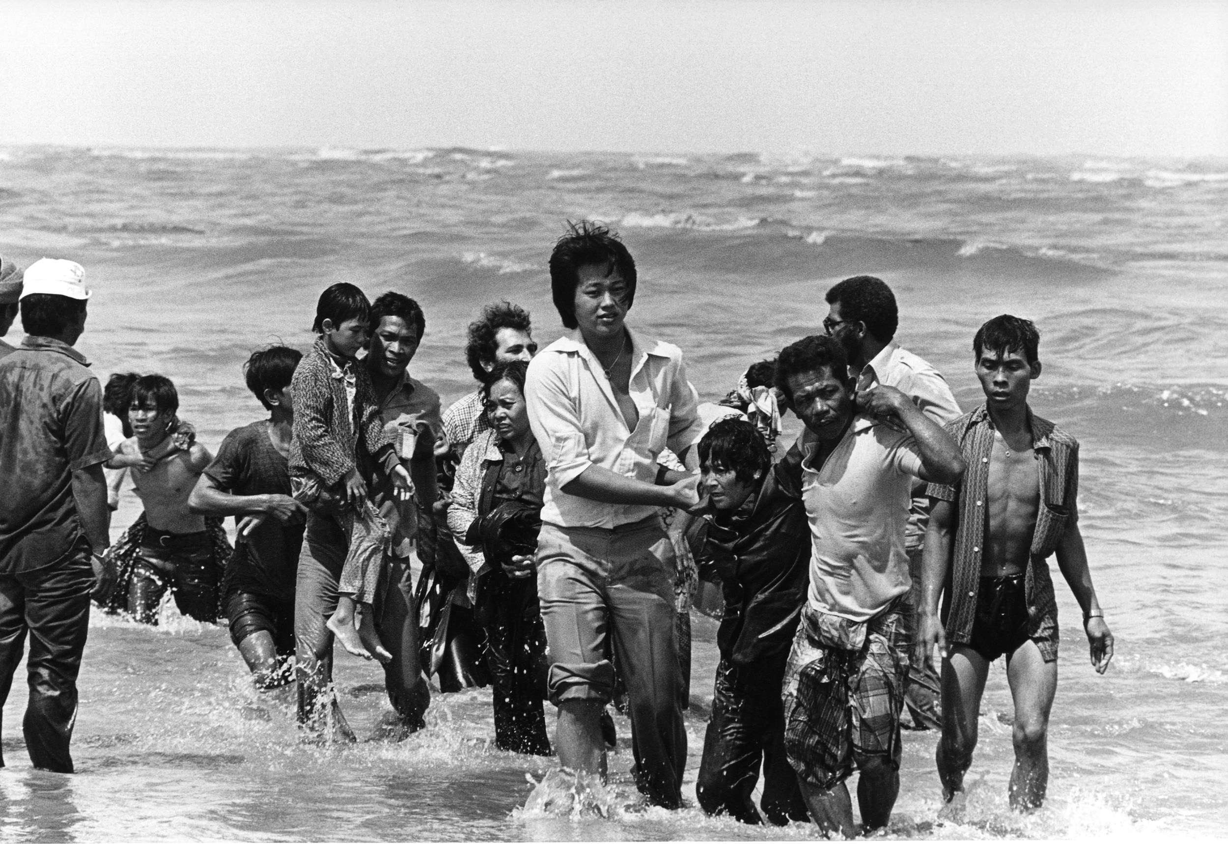 Vietnamese refugees reach shore after their boat sank off the coat of Malaysia in the late 1970s. Picture: AFP