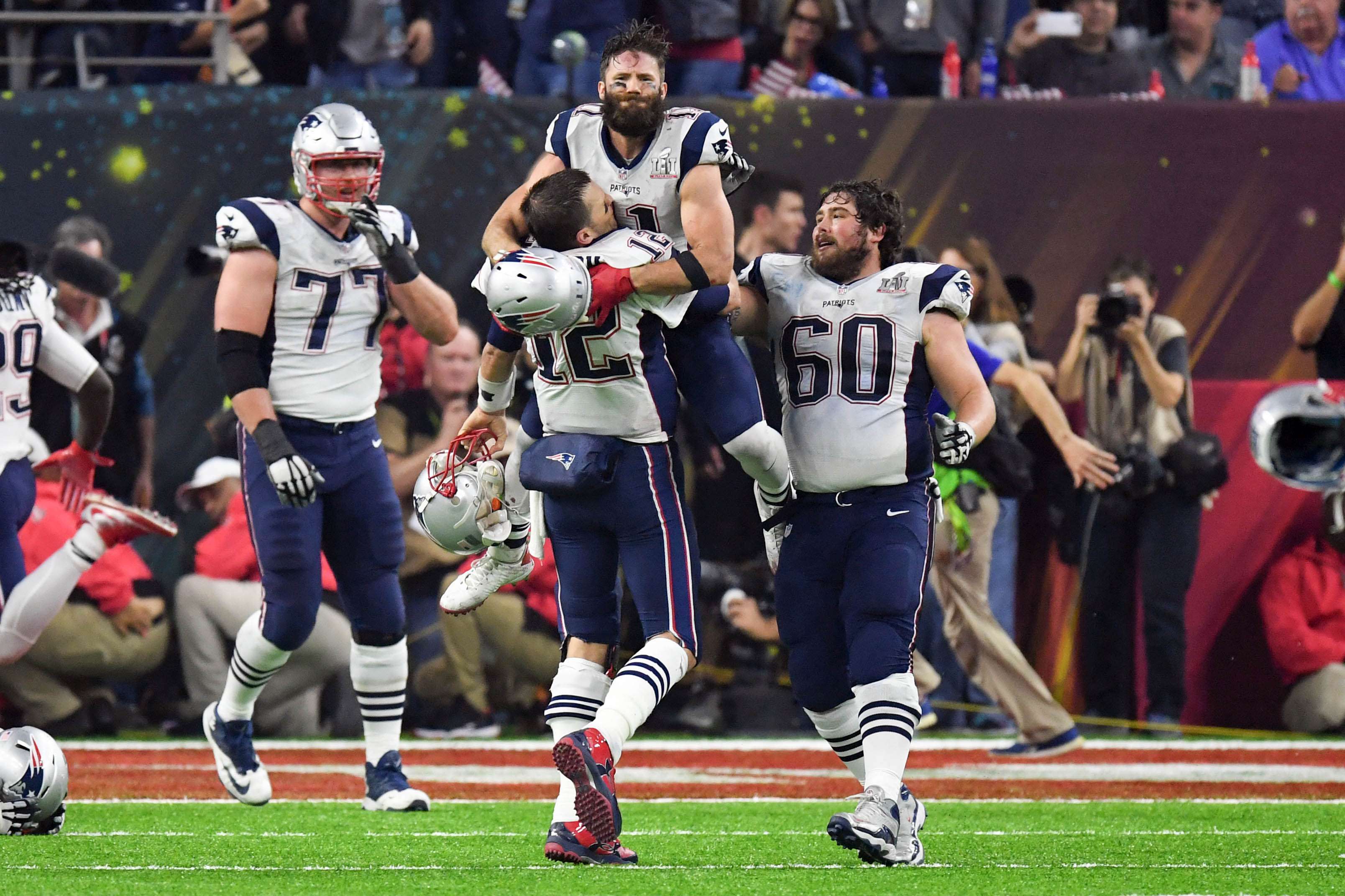 New England Patriots quarterback Tom Brady and wide receiver Julian Edelman celebrate their Super Bowl 51 win over Atlanta Falcons. Photo: USA Today