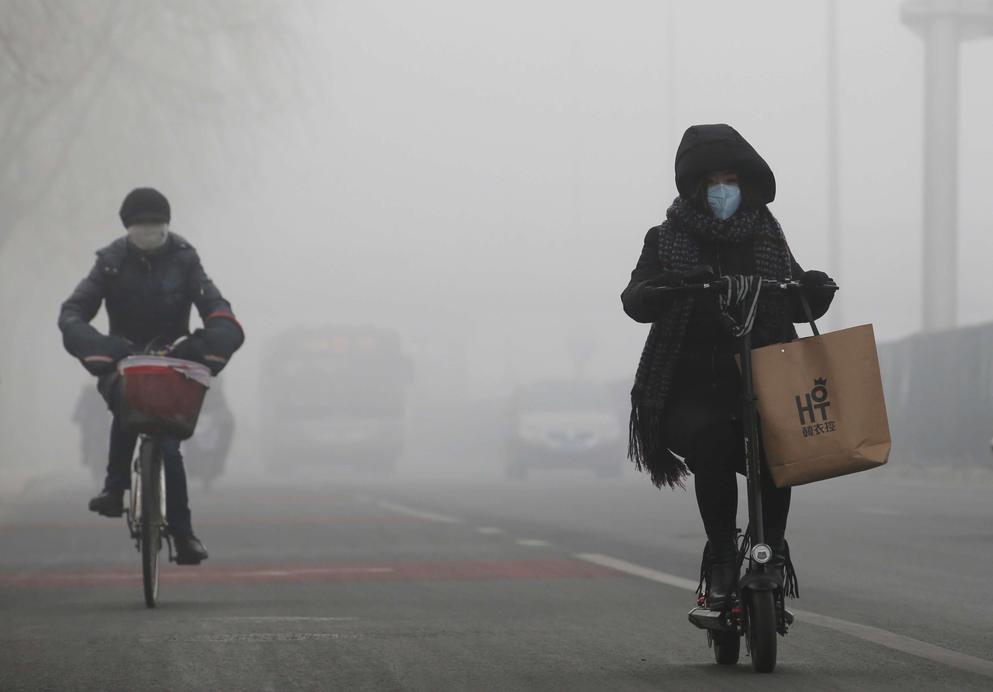 The switch to cleaner burning natural gas could add up to 50 million new users in northern China. Beijing’s poor air quality, dubbed ‘Airpocalypse’ affecting commuters on February 14, 2017.