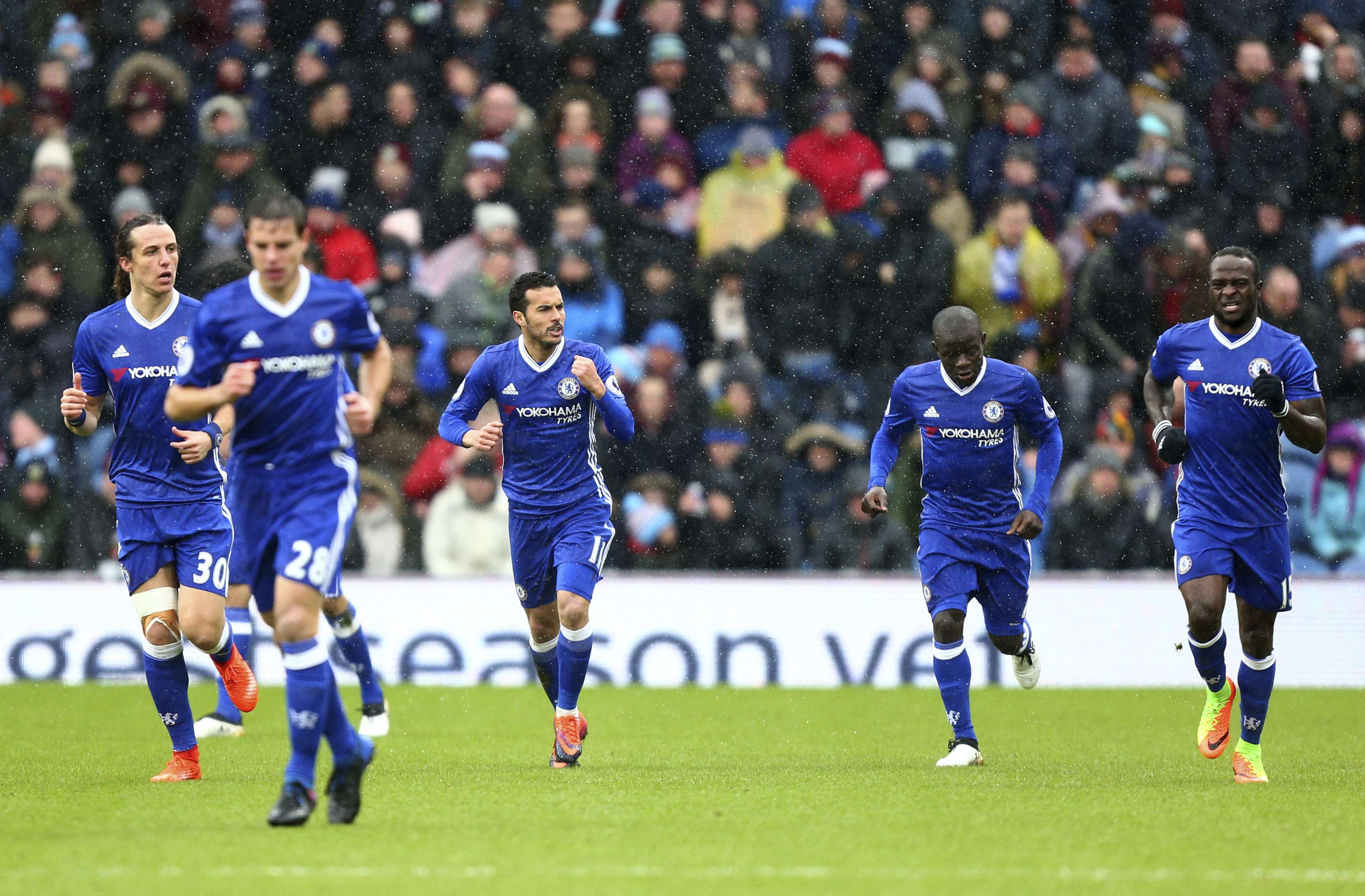 Chelsea's Pedro (third left) celebrates scoring his side's first goal against Burnley. Photo: AP