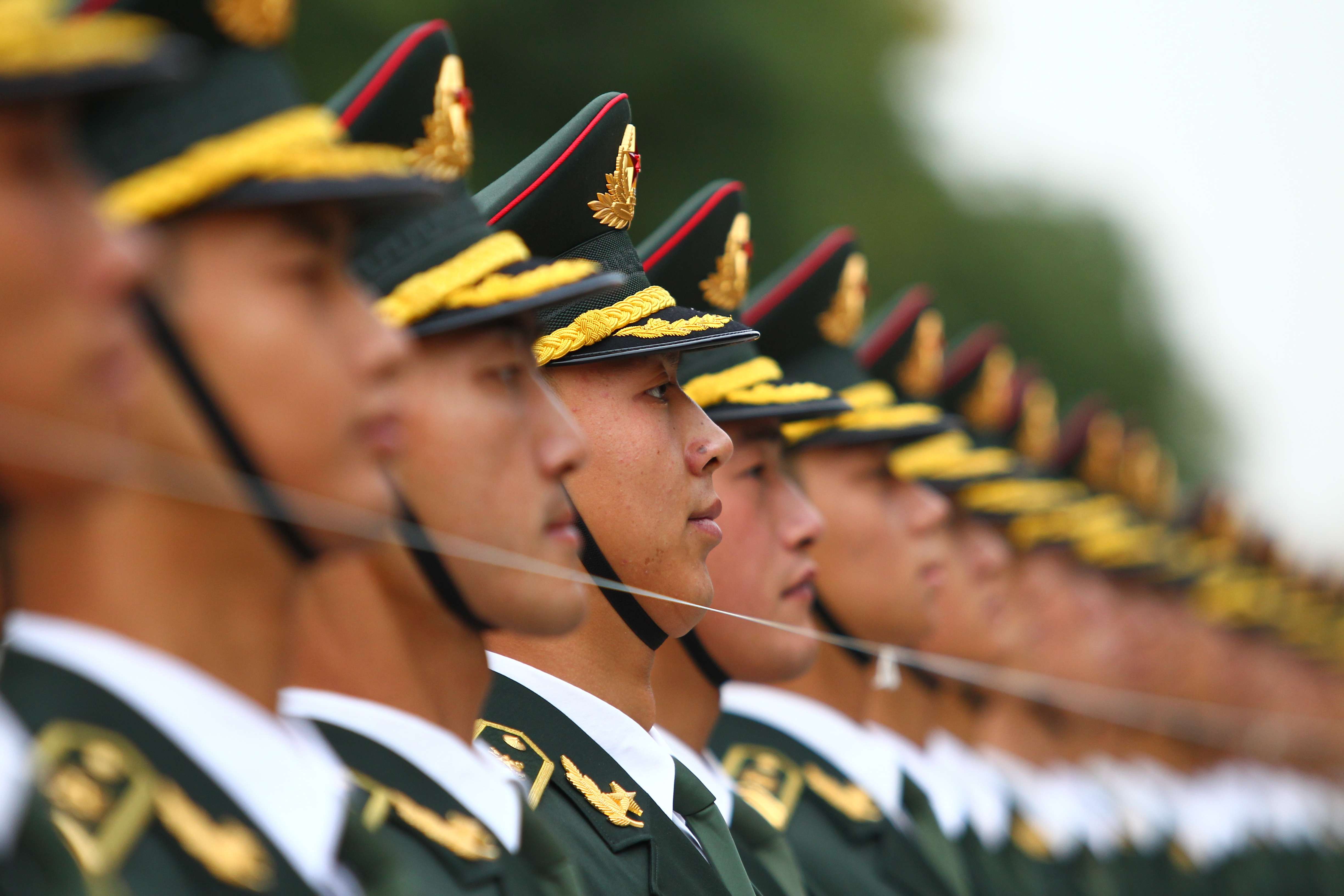 A file picture of a Chinese honour guard outside the Great Hall of the People in Beijing. Photo: Simon Song