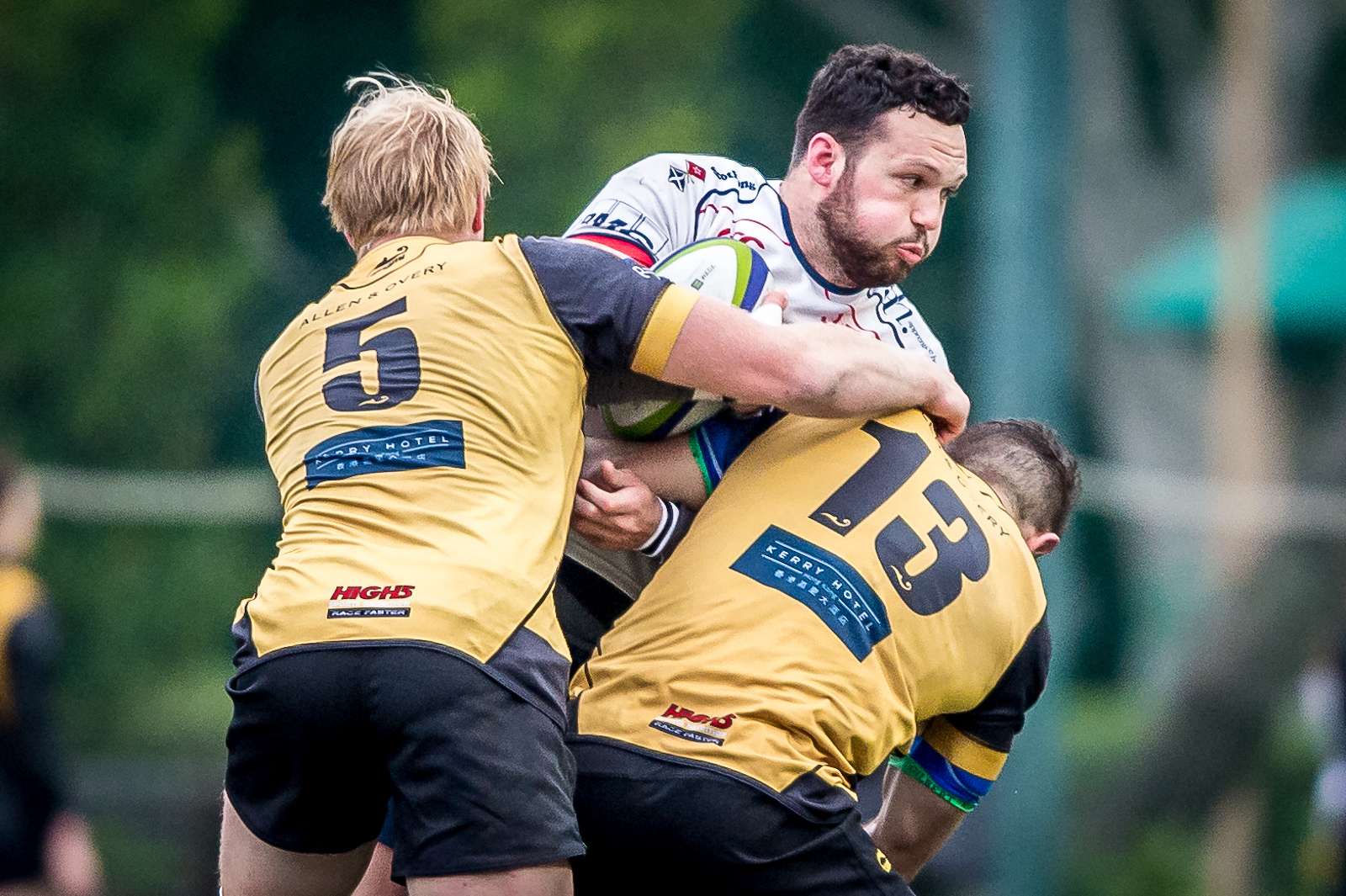 HK Scottish centre Conor Hartley feels the heat in his side’s quarter-final loss to the Borrelli Walsh USRC Tigers. Photo: HKRU
