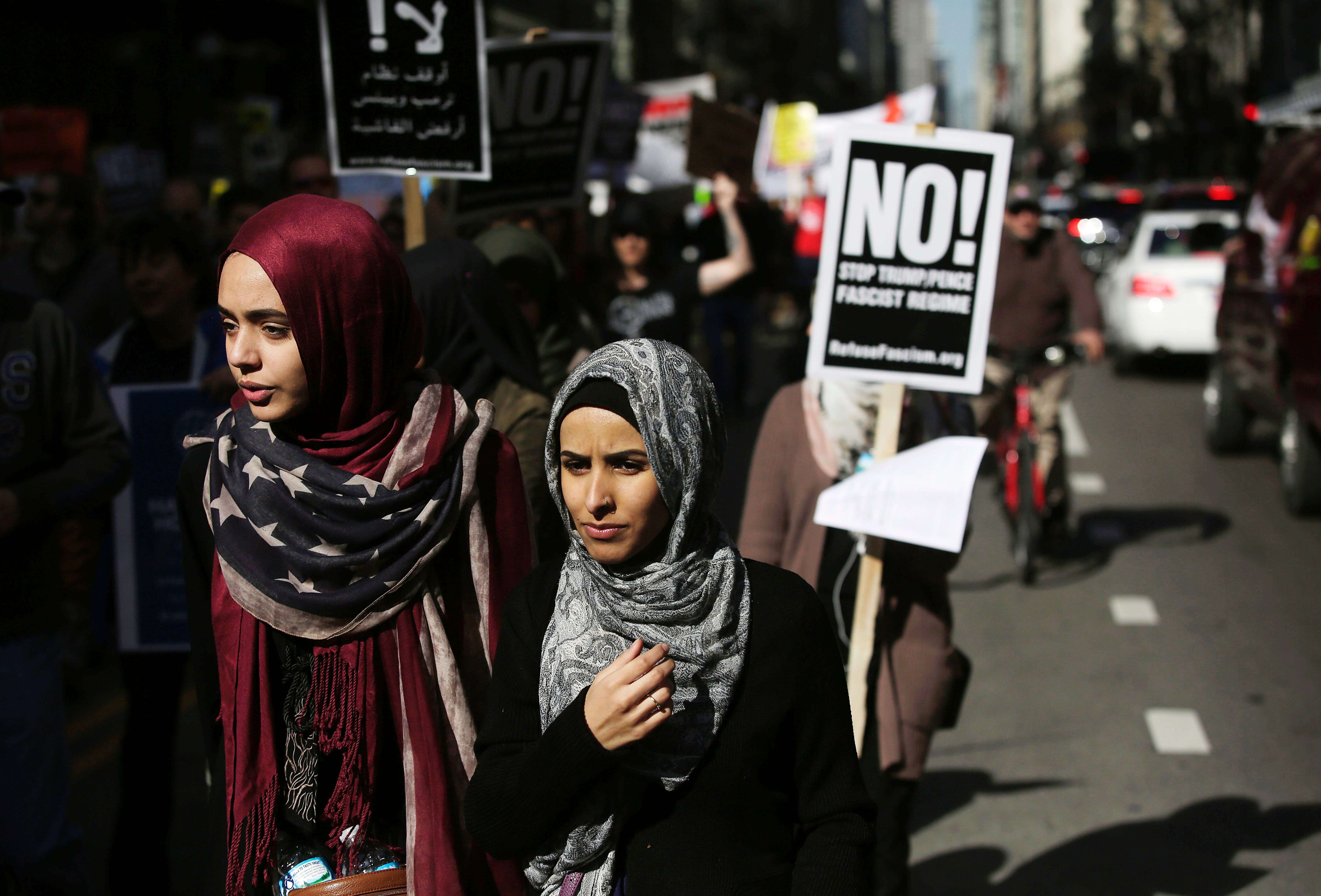 Muslim women protest against US President Donald Trump on February 19 in Chicago, Illinois. Anti-Muslim ideologues have for years treated Islam as a non-religion that threatens American life and law through a violent ideology of sharia. Photo: AFP