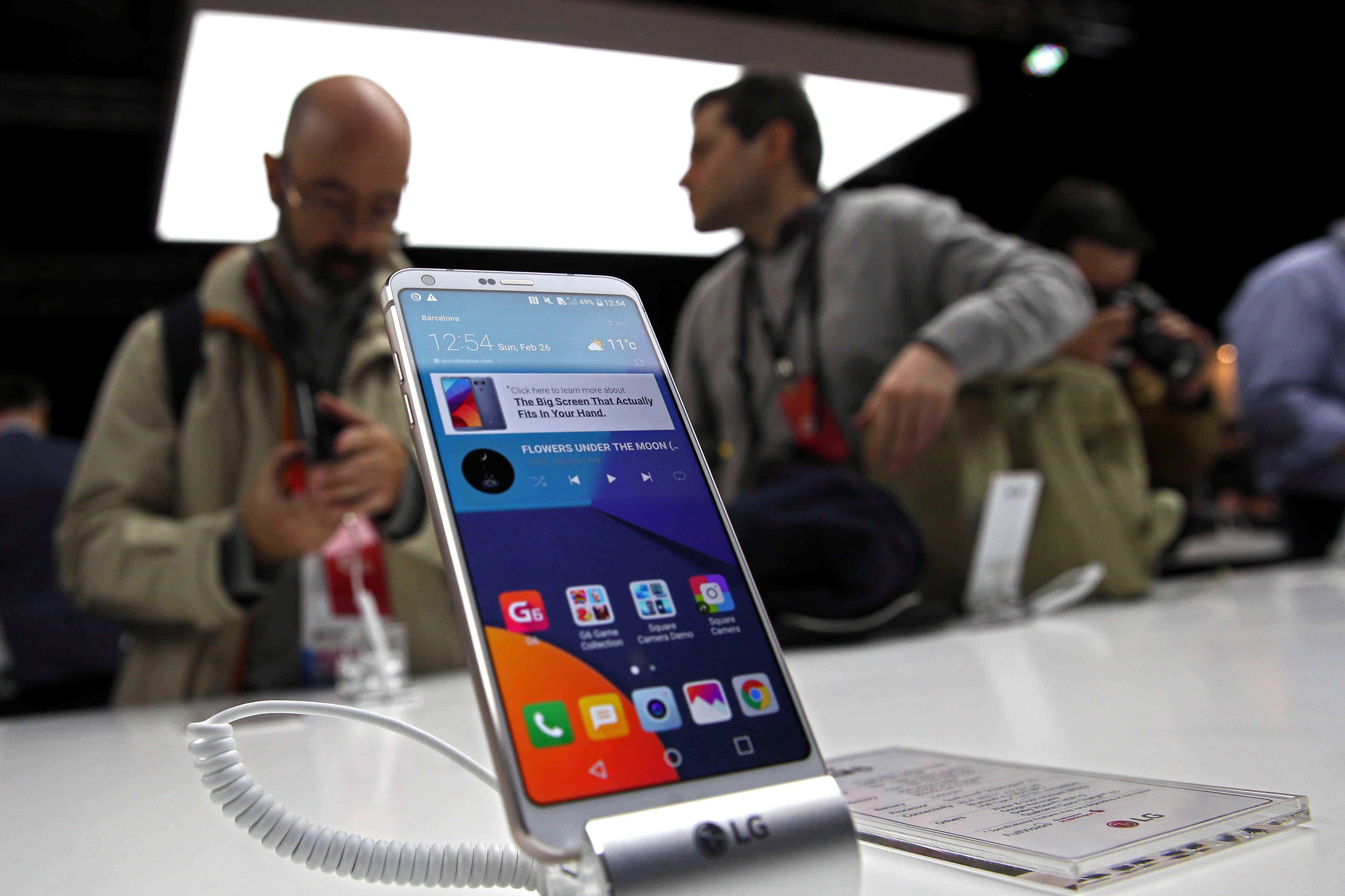 Visitors at the Mobile World Congress (MWC) in Barcelona. The congress is said to be the largest of its kind for the mobile industry and is held this year under the motto 'The Next Element.' Photo: EPA