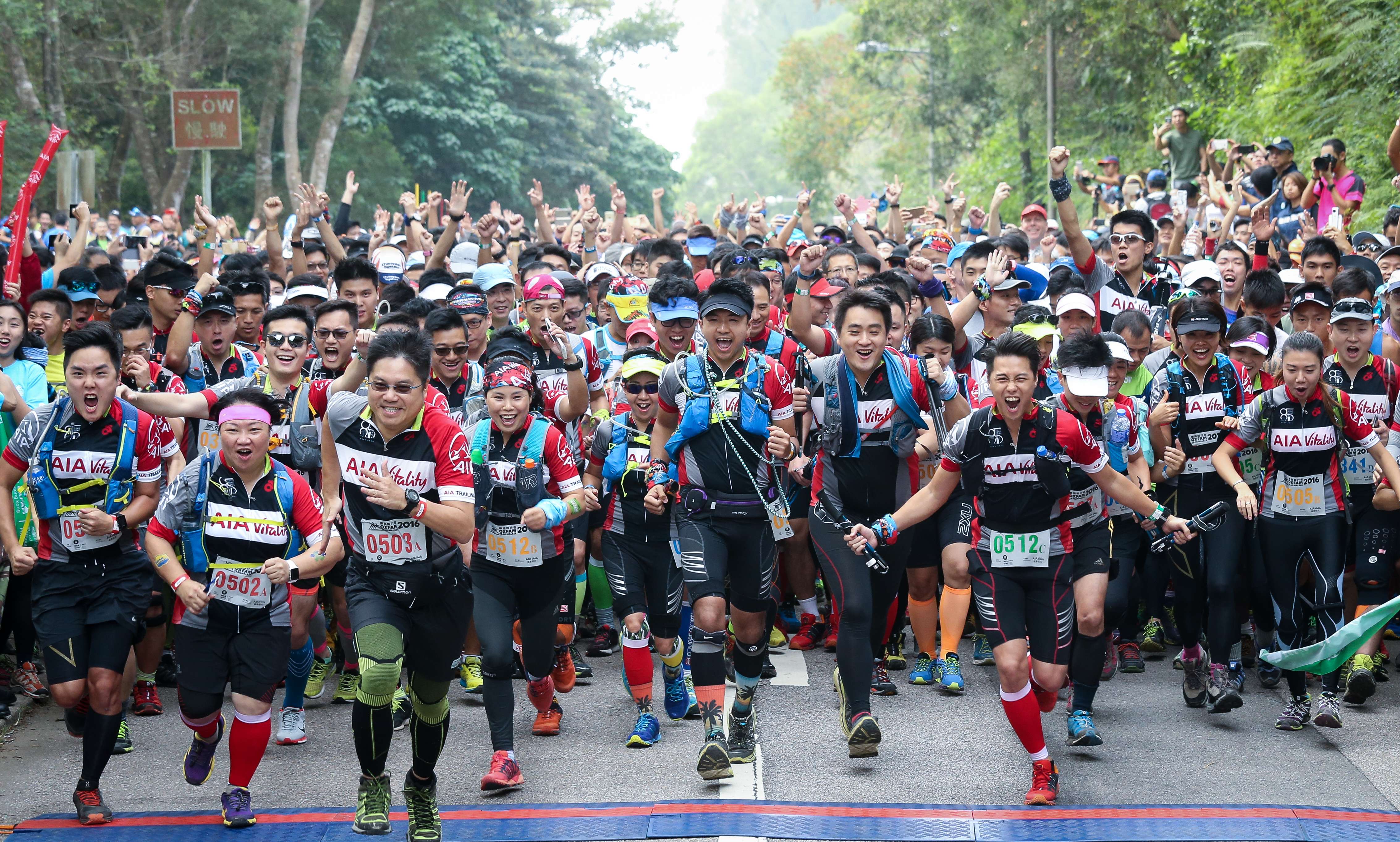 Competitors at the Oxfam Trailwalker, one of the city’s most popular mass participation events. Photo: Dickson Lee / SCMP