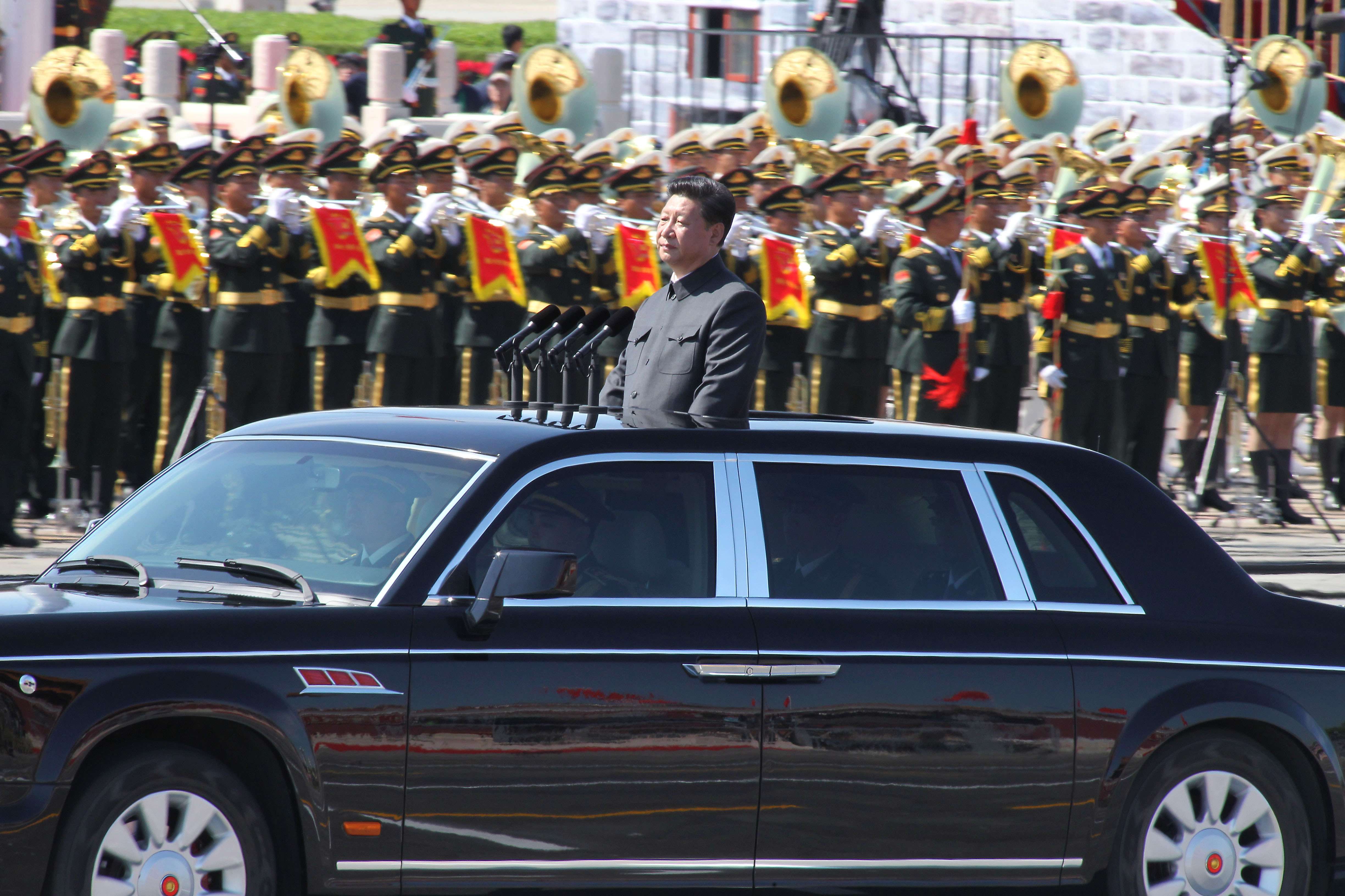 Xi Jinping reviews the parade soldiers at the military parade in Tiananmen Square in Beijing. Photo: Simon Song