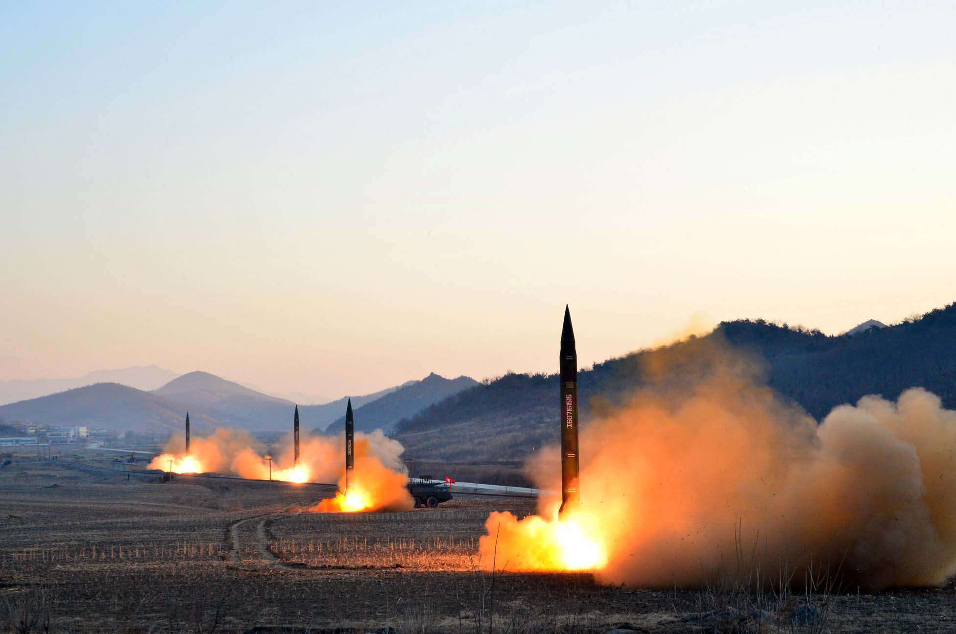An undated picture released by North Korea's Korean Central News Agency on Tuesday shows the launch of four ballistic missiles during a military drill at an undisclosed location in North Korea. Photo: AFP