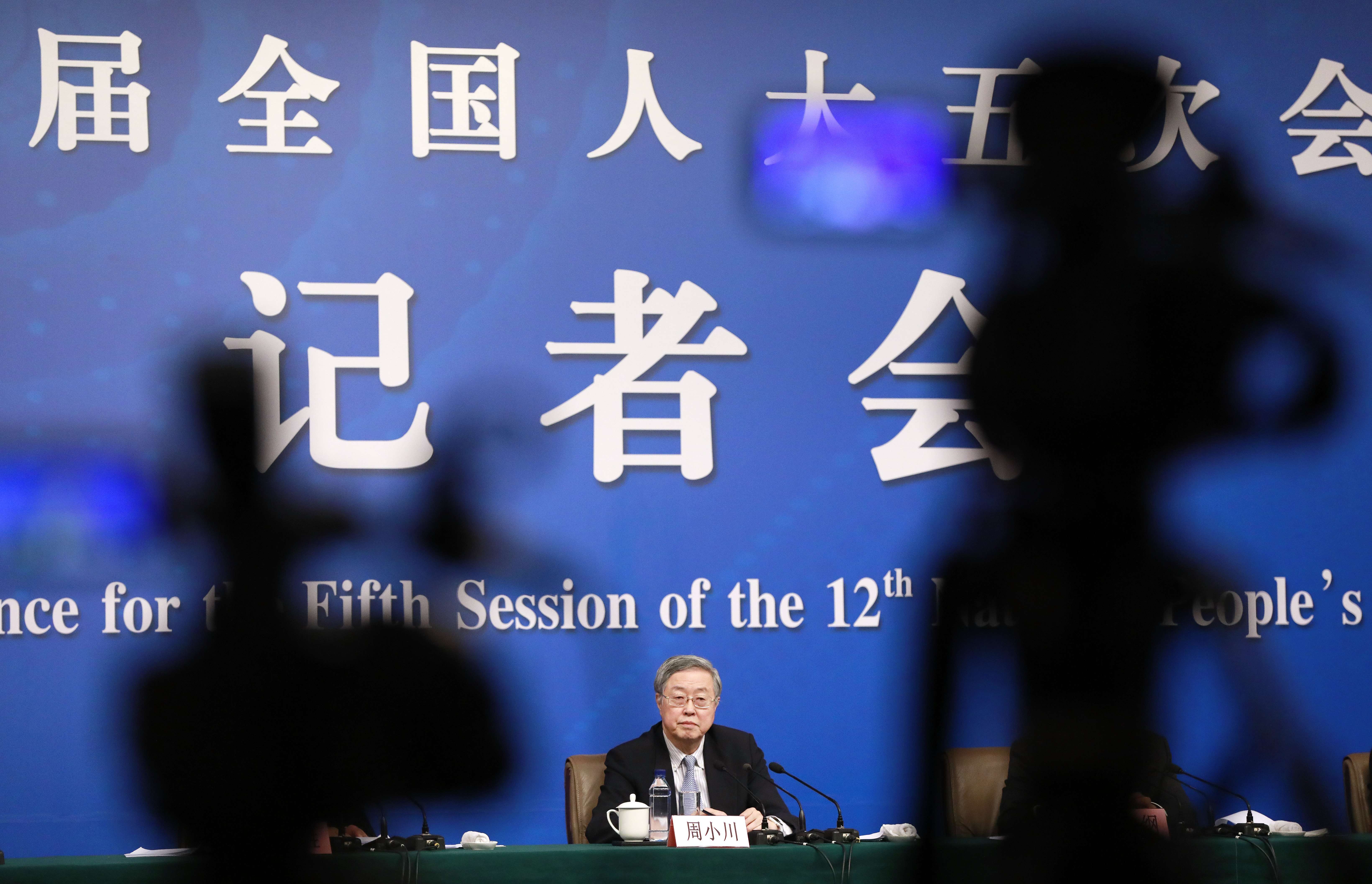 Central bank chief Zhou Xiaochuan says suspicions about the yuan and the Chinese economy “went too far” last year. Photo: EPA
