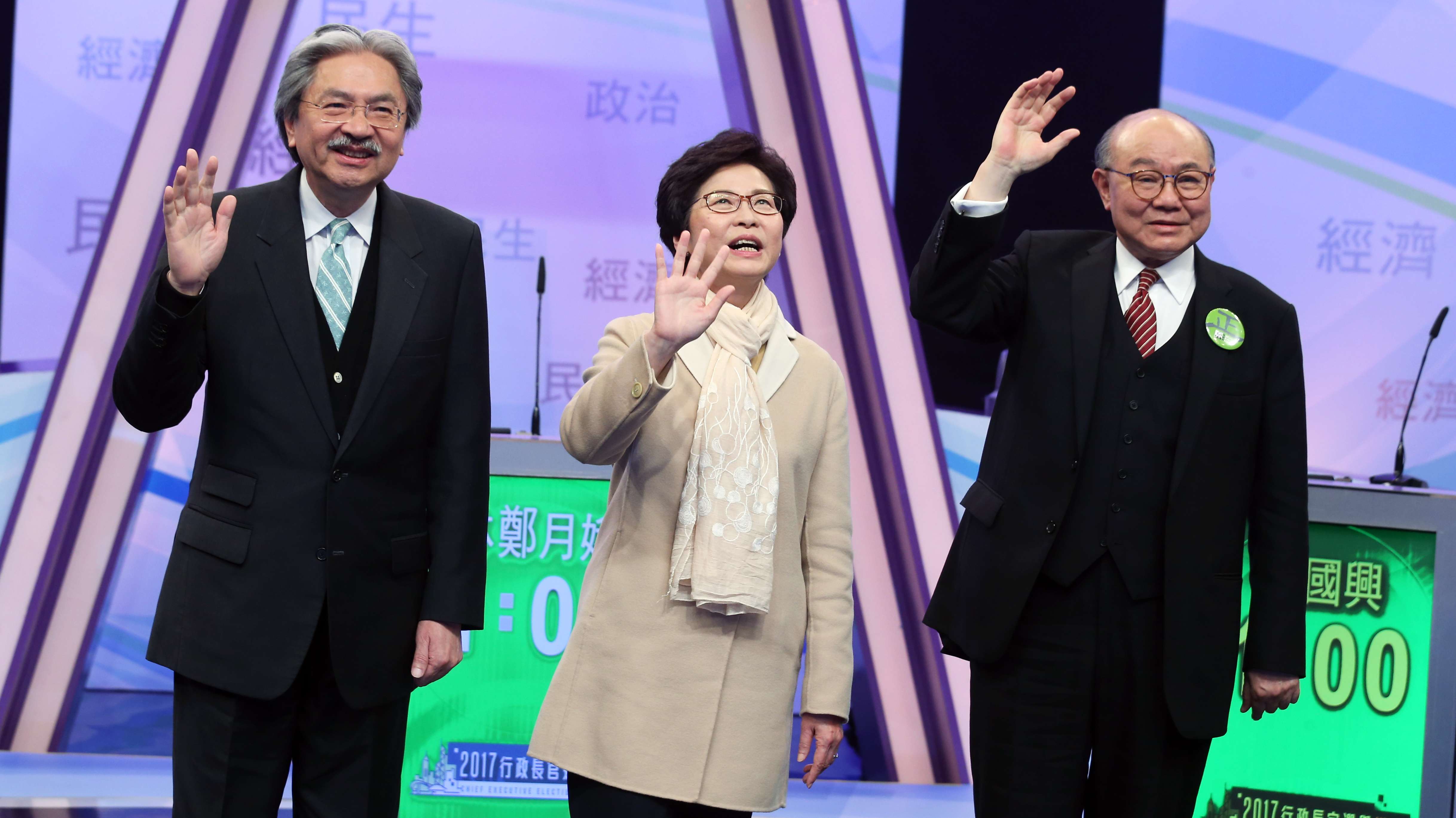 John Tsang, Carrie Lam and Woo Kwok-hing on the debate stage at TVB City in Tseung Kwan O. Photo: K. Y. Cheng
