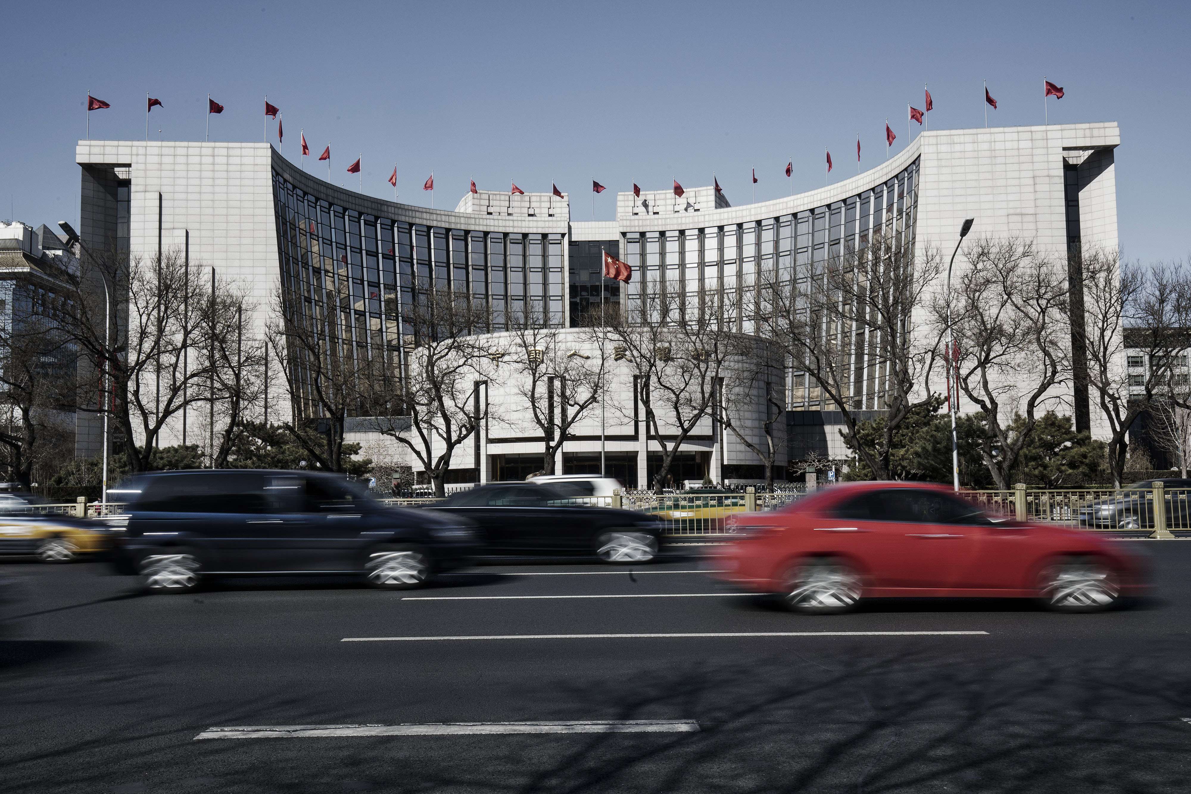 The People’s Bank of China headquarters in Beijing. The central bank is drafting an umbrella regulation to look after the country’s 60 trillion yuan asset management business.Photo: Bloomberg